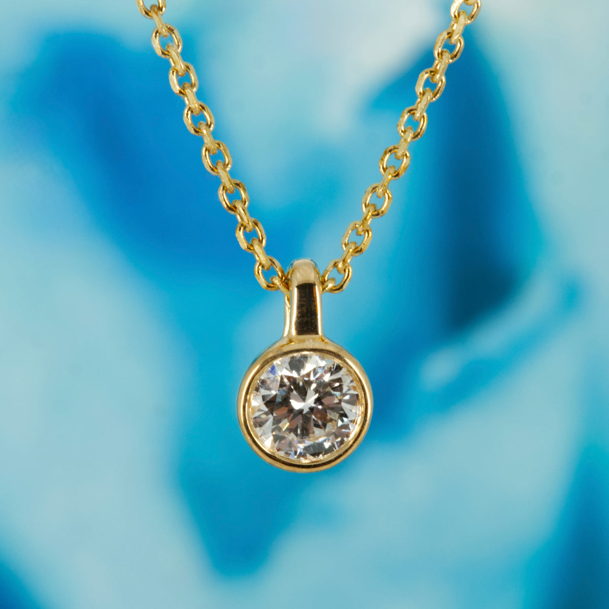 9ct Yellow Gold 0.20ct Round Brilliant Cut Lab Grown Diamond Pendant on a 16”-18” Chain