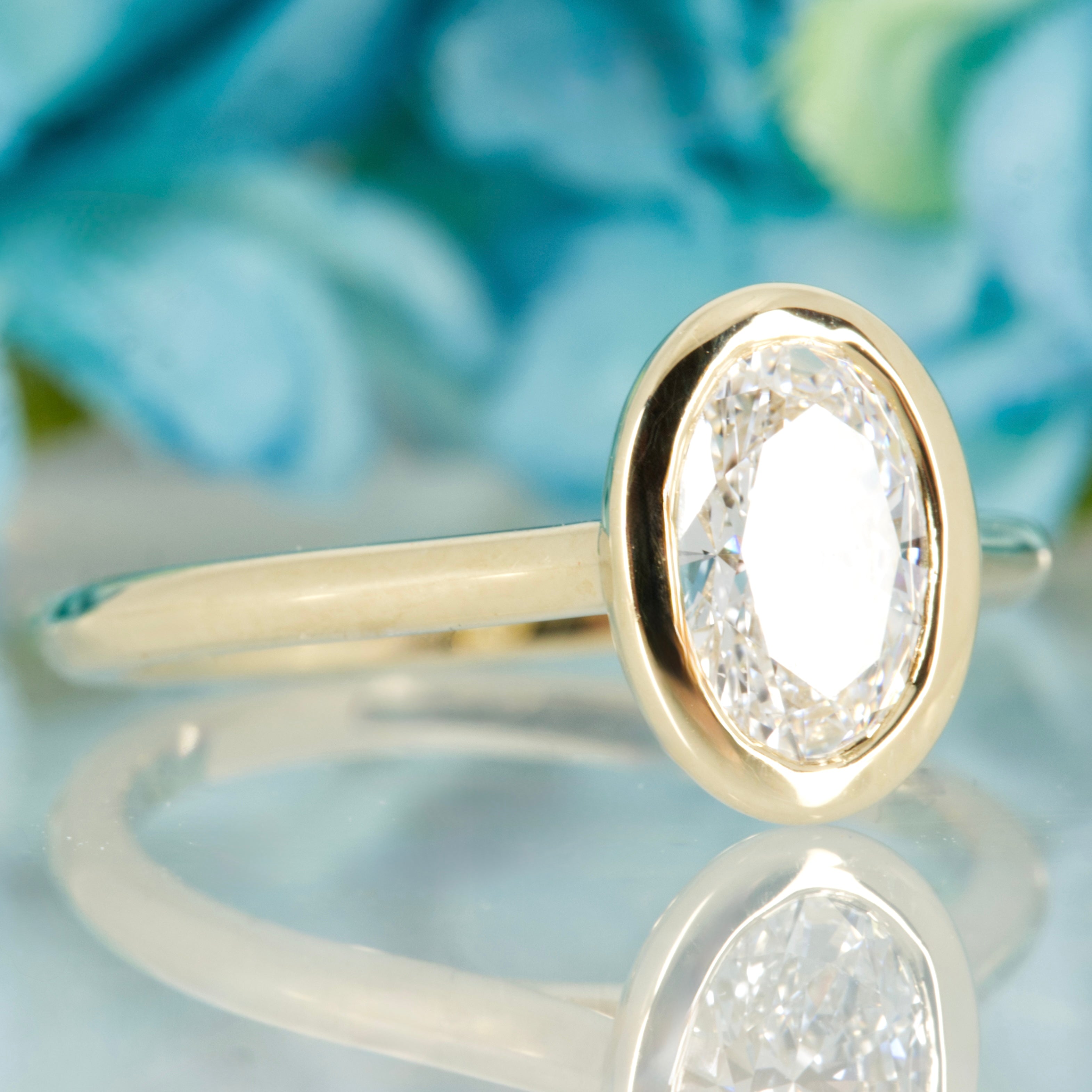 9ct Yellow Gold 1.00ct Oval Cut Lab Grown Diamond Bezel Set Solitaire Ring