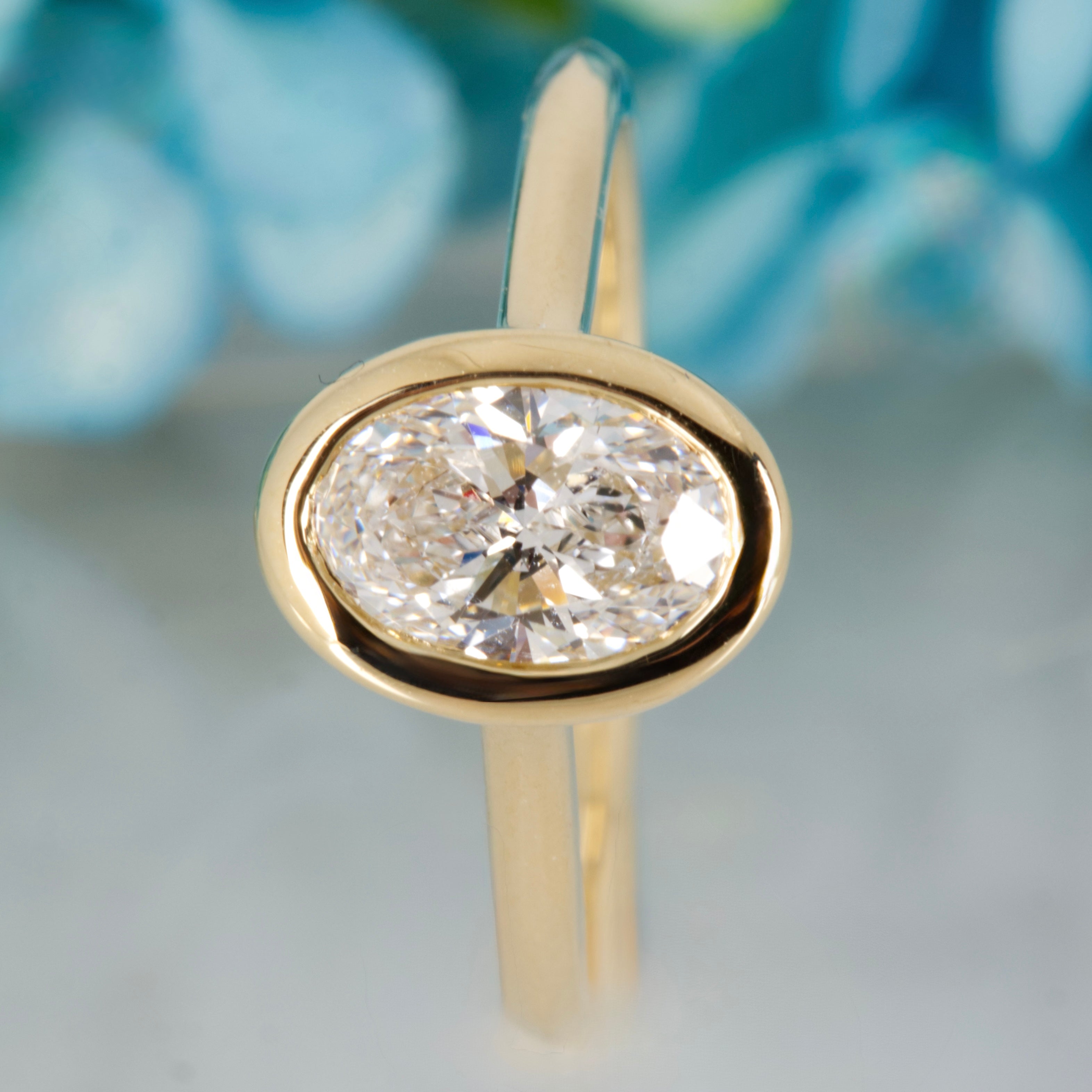 9ct Yellow Gold 1.00ct Oval Cut Lab Grown Diamond Bezel Set Solitaire Ring