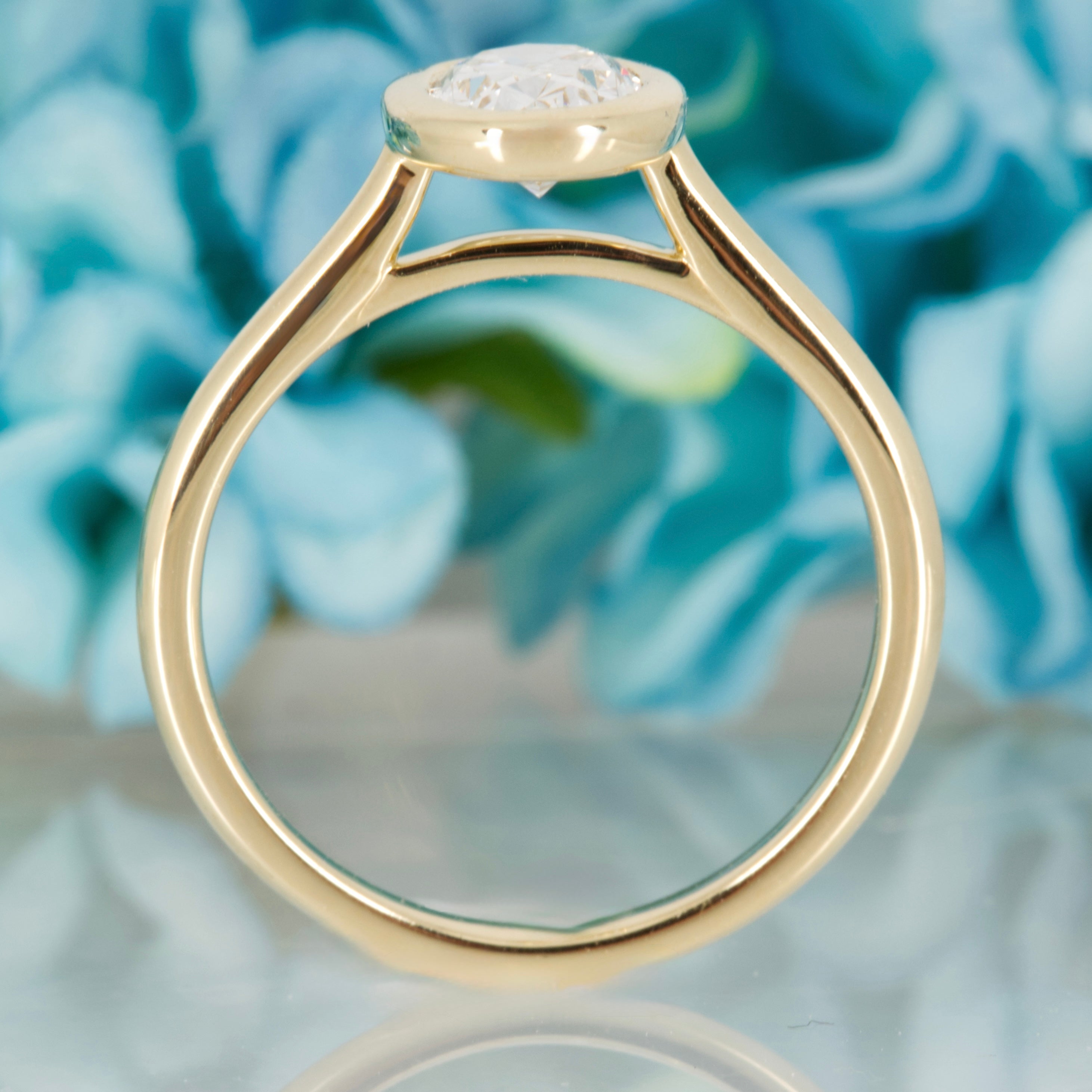 9ct Yellow Gold 1.00ct Oval Cut Lab Grown Diamond Bezel Set Solitaire Ring