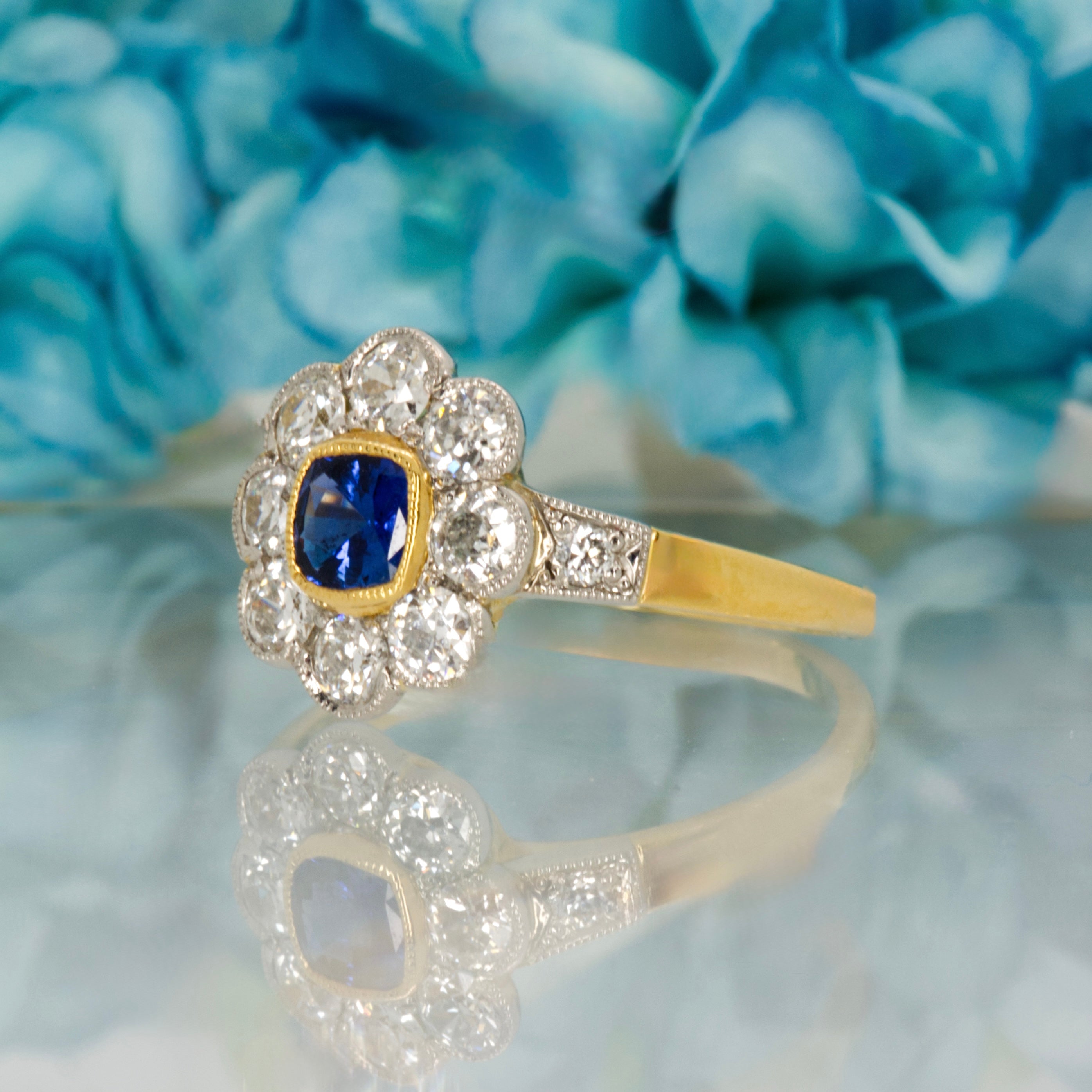 Pre-Loved 18ct Yellow Gold & Platinum Cushion Cut Sapphire & Diamond Daisy Cluster Ring