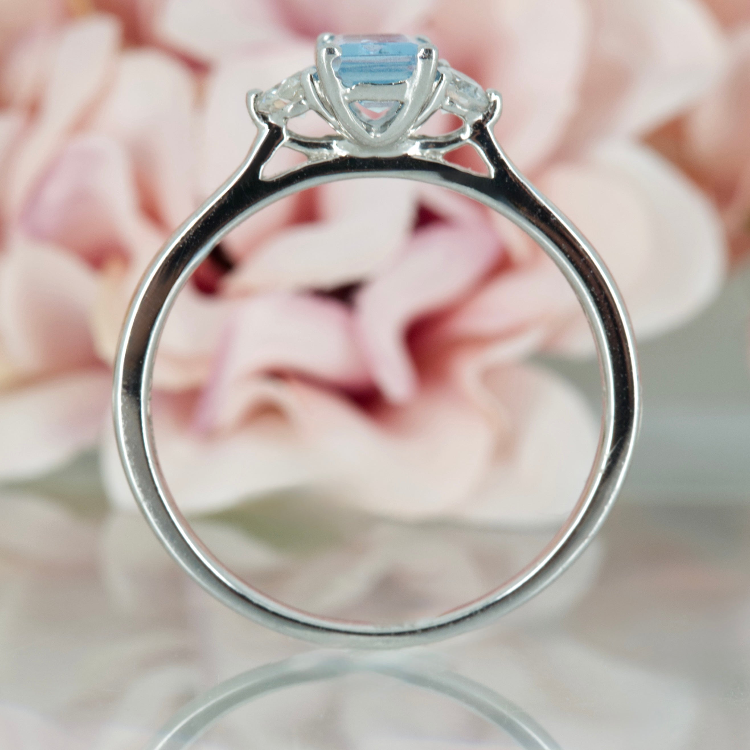 Platinum Octagonal Cut Aquamarine & Round Brilliant Cut Diamond Trilogy Ring