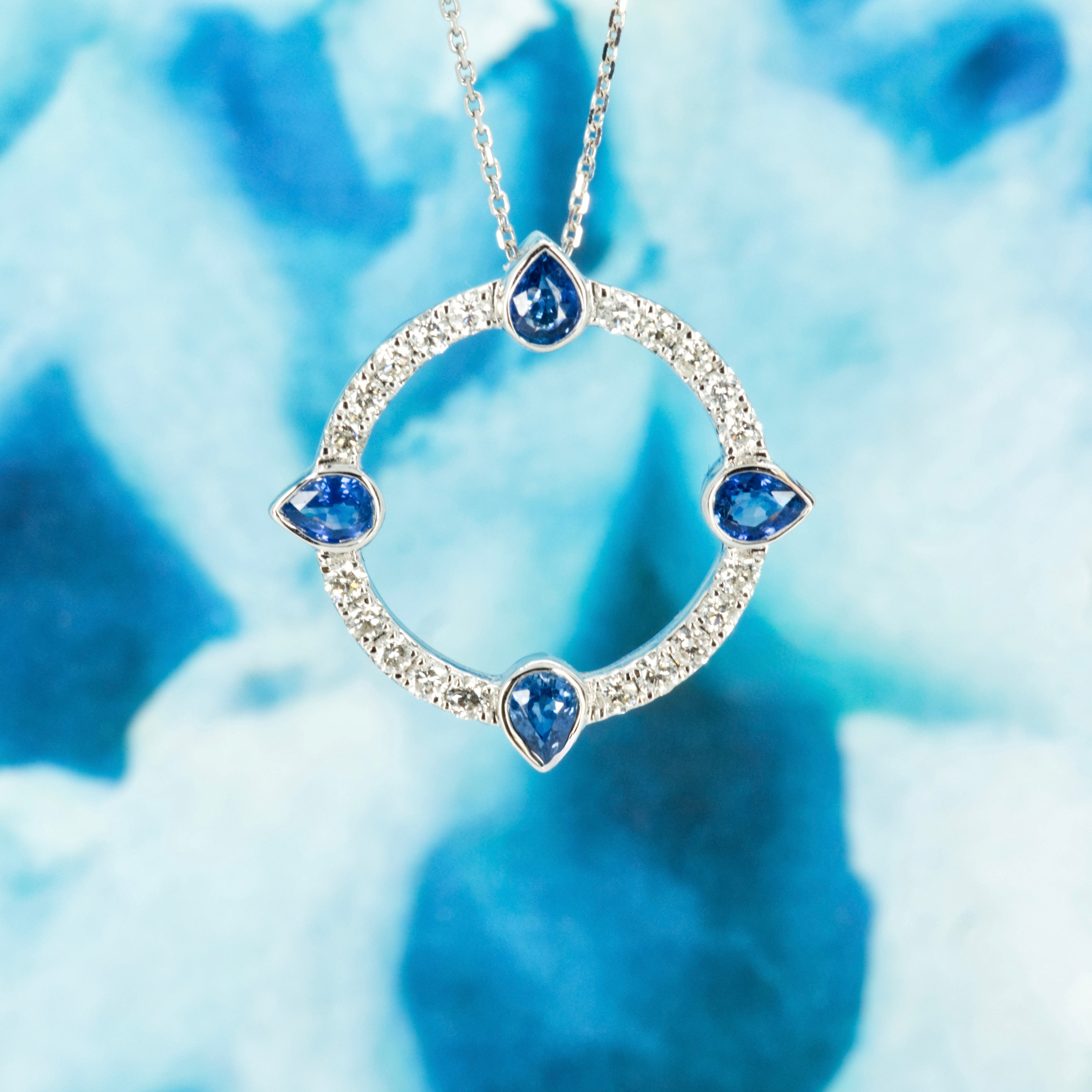 18ct White Gold Pear Cut Sapphire & Round Brilliant Cut Diamond Circle Pendant & Chain