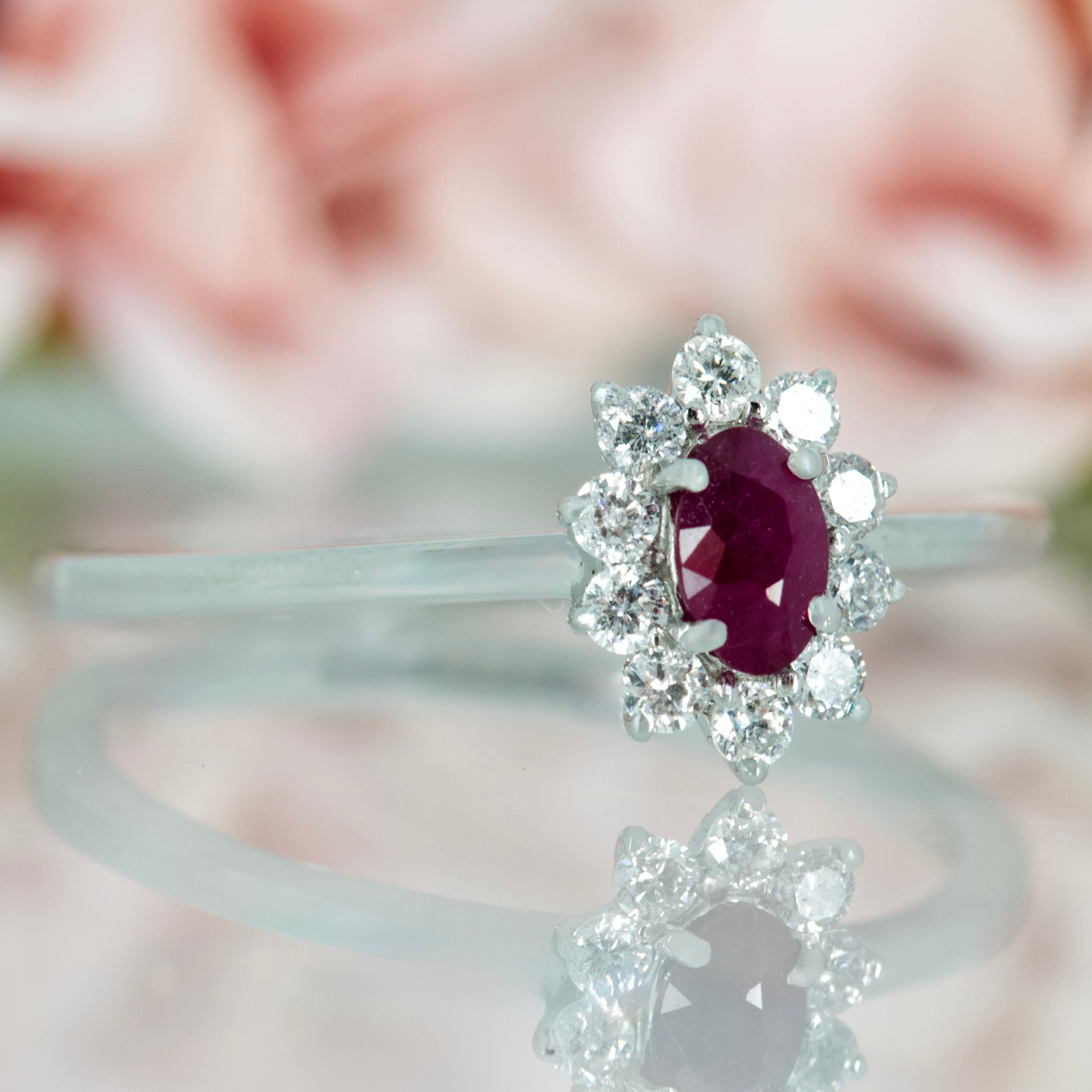 Platinum Oval Cut Ruby & Round Brilliant Cut Diamond Cluster Ring