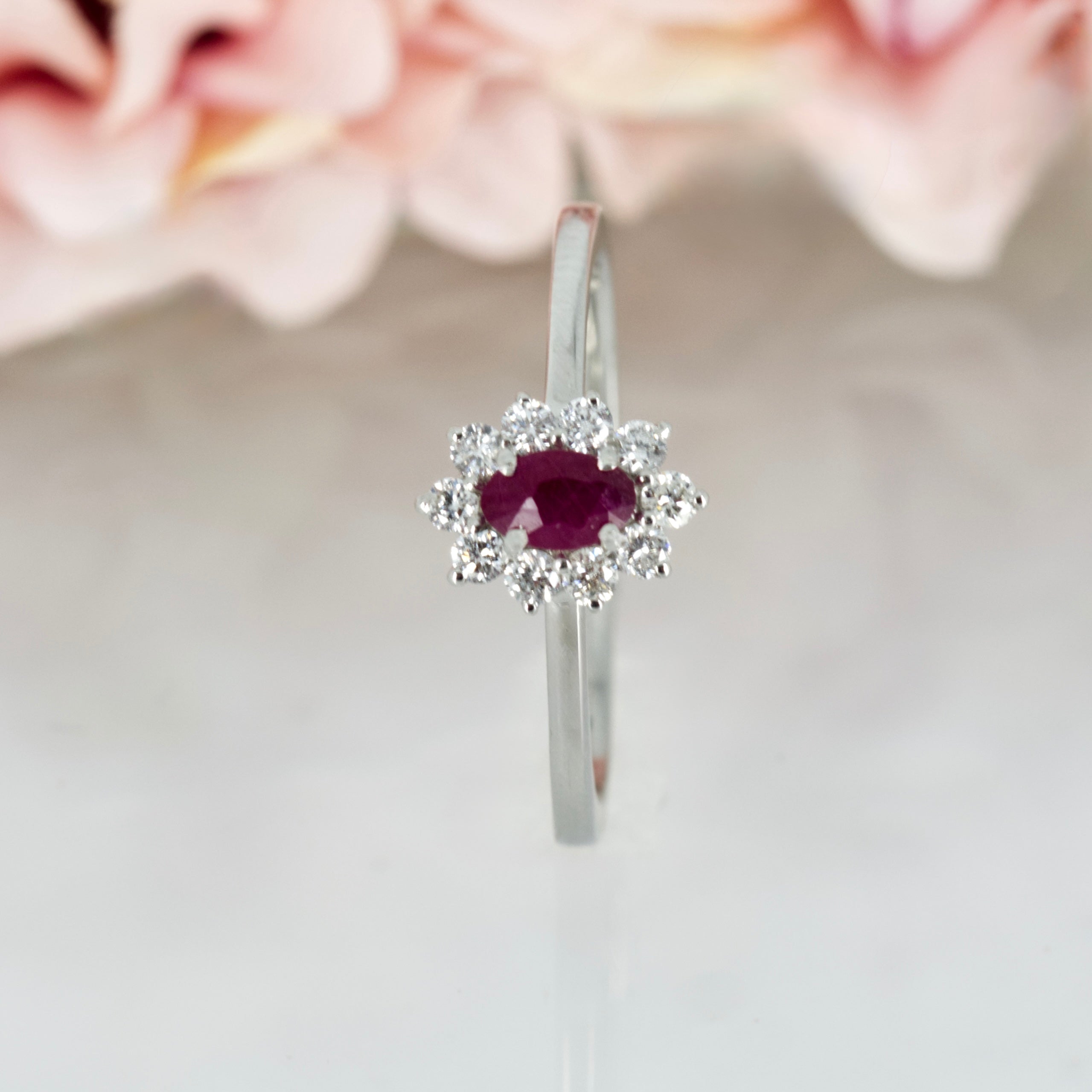 Platinum Oval Cut Ruby & Round Brilliant Cut Diamond Cluster Ring