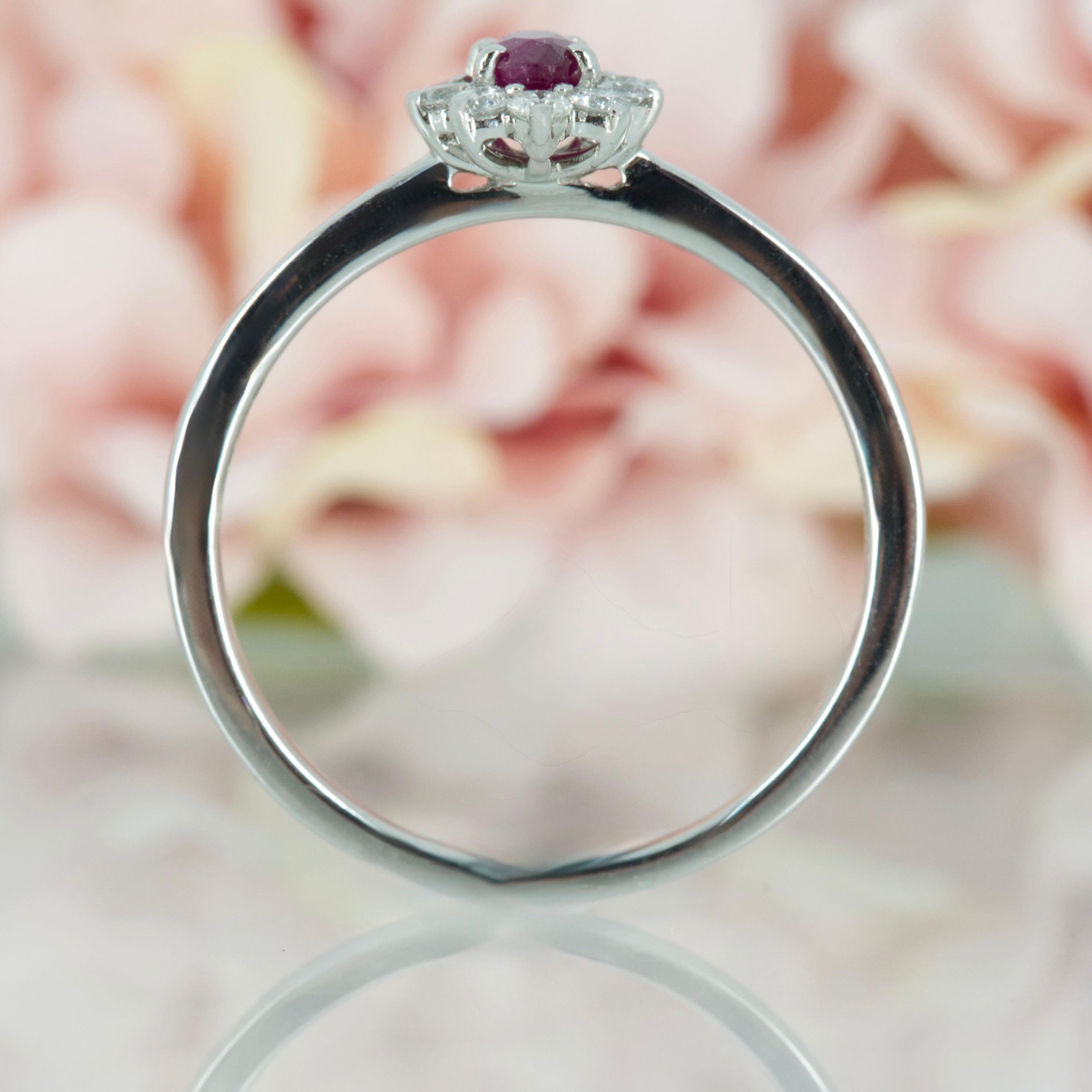 Platinum Oval Cut Ruby & Round Brilliant Cut Diamond Cluster Ring