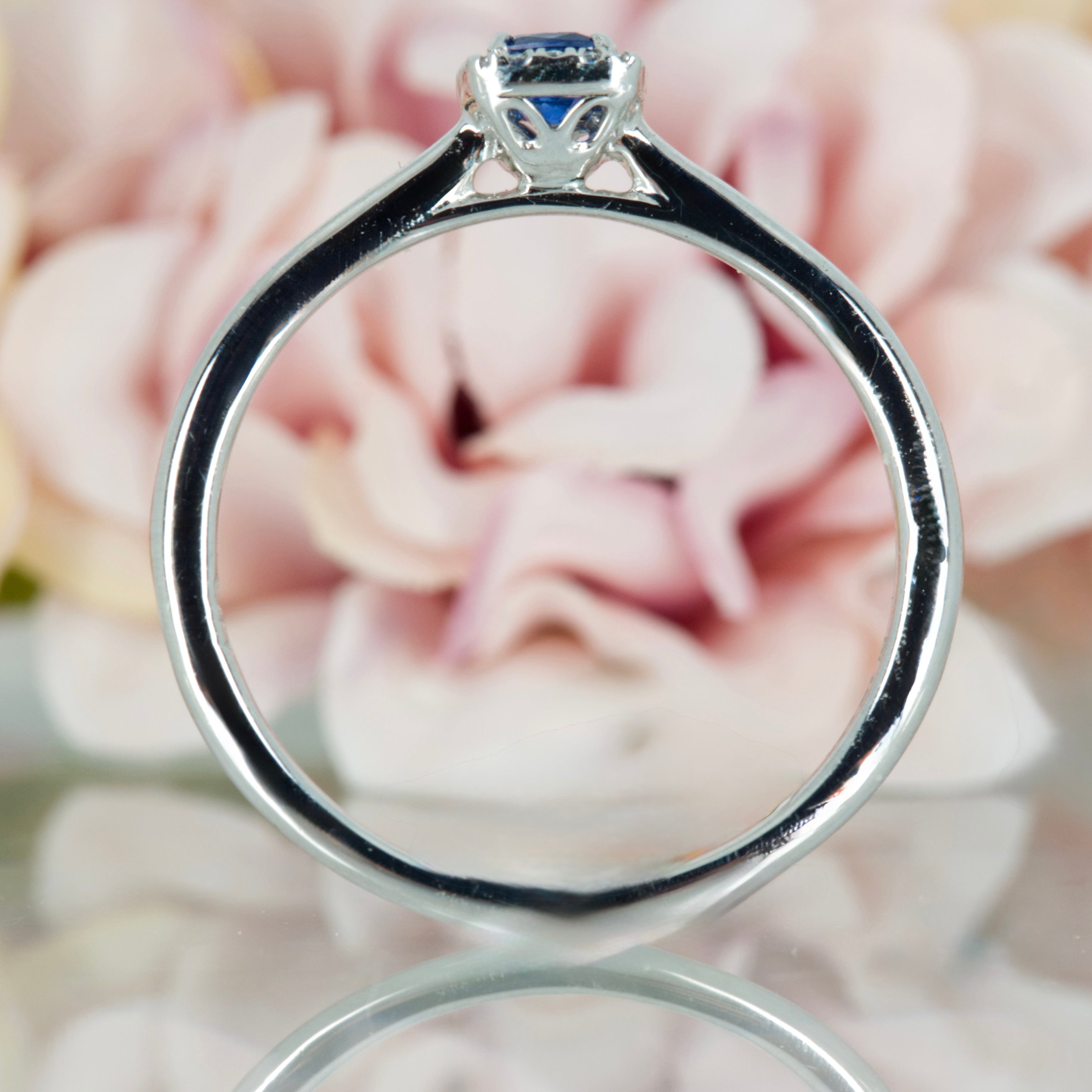 Platinum Cushion Cut Sapphire & Round Brilliant Cut Diamond Halo Cluster Ring