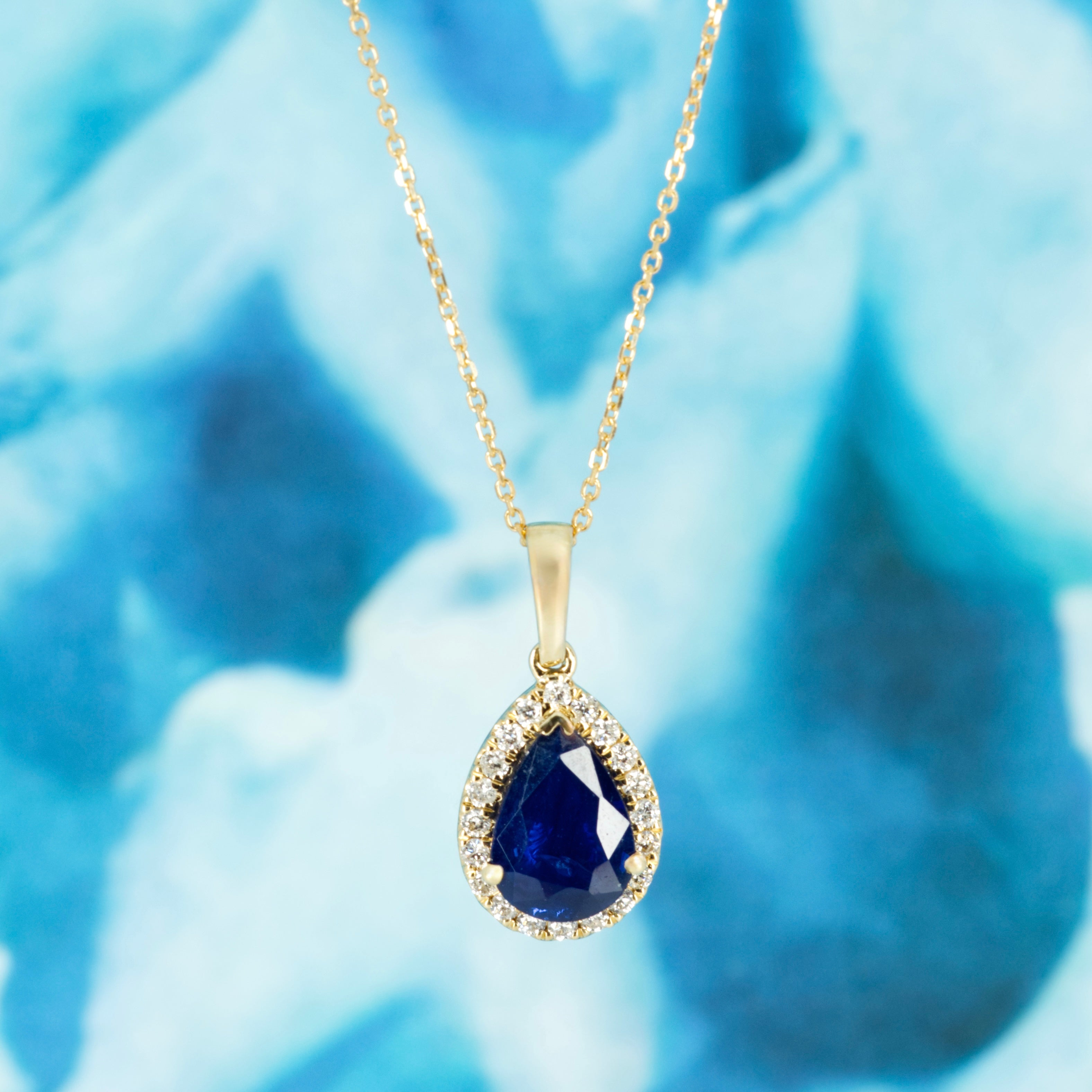 9ct Yellow Gold Pear Cut Sapphire & Round Brilliant Cut Diamond Halo Cluster Pendant & Chain