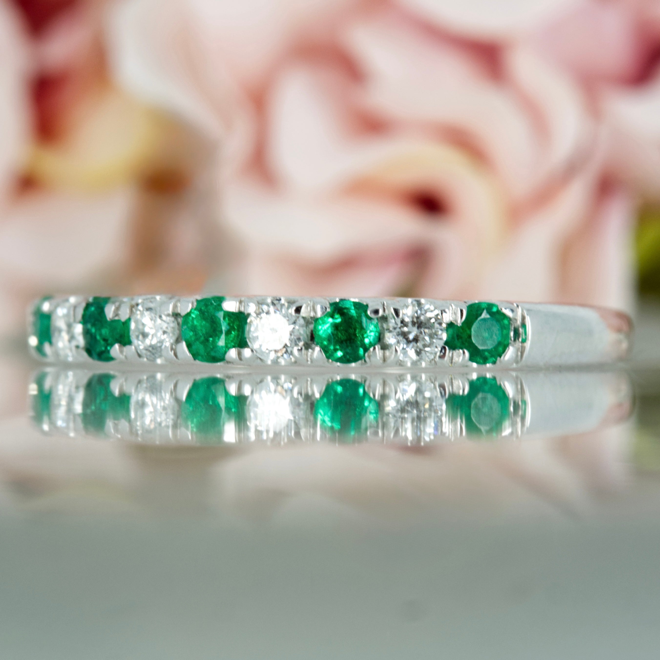 Platinum Round Cut Emerald & Round Brilliant Cut Diamond Claw Set Half Eternity Ring