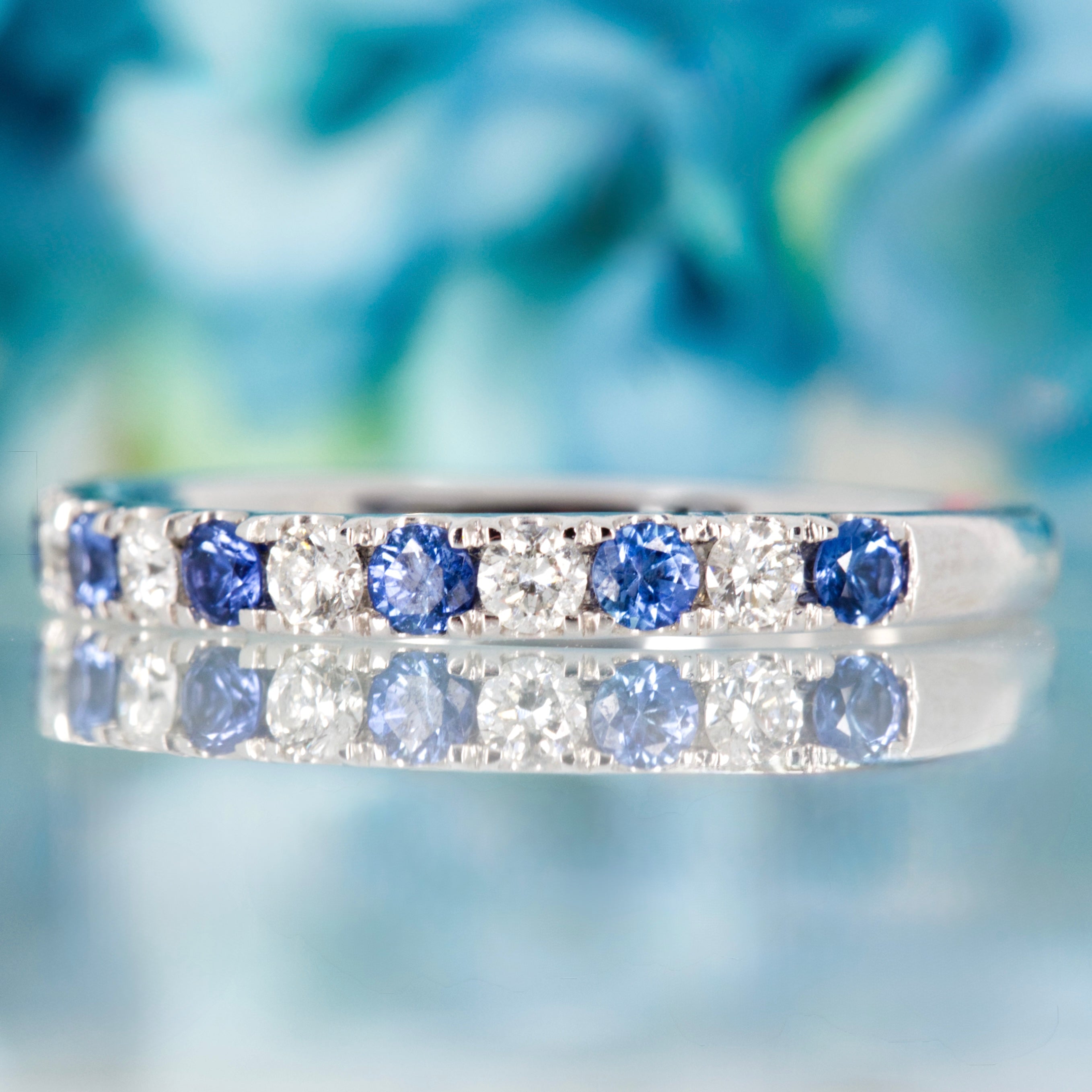Platinum Round Cut Sapphire & Diamond Claw Set Half Eternity Ring