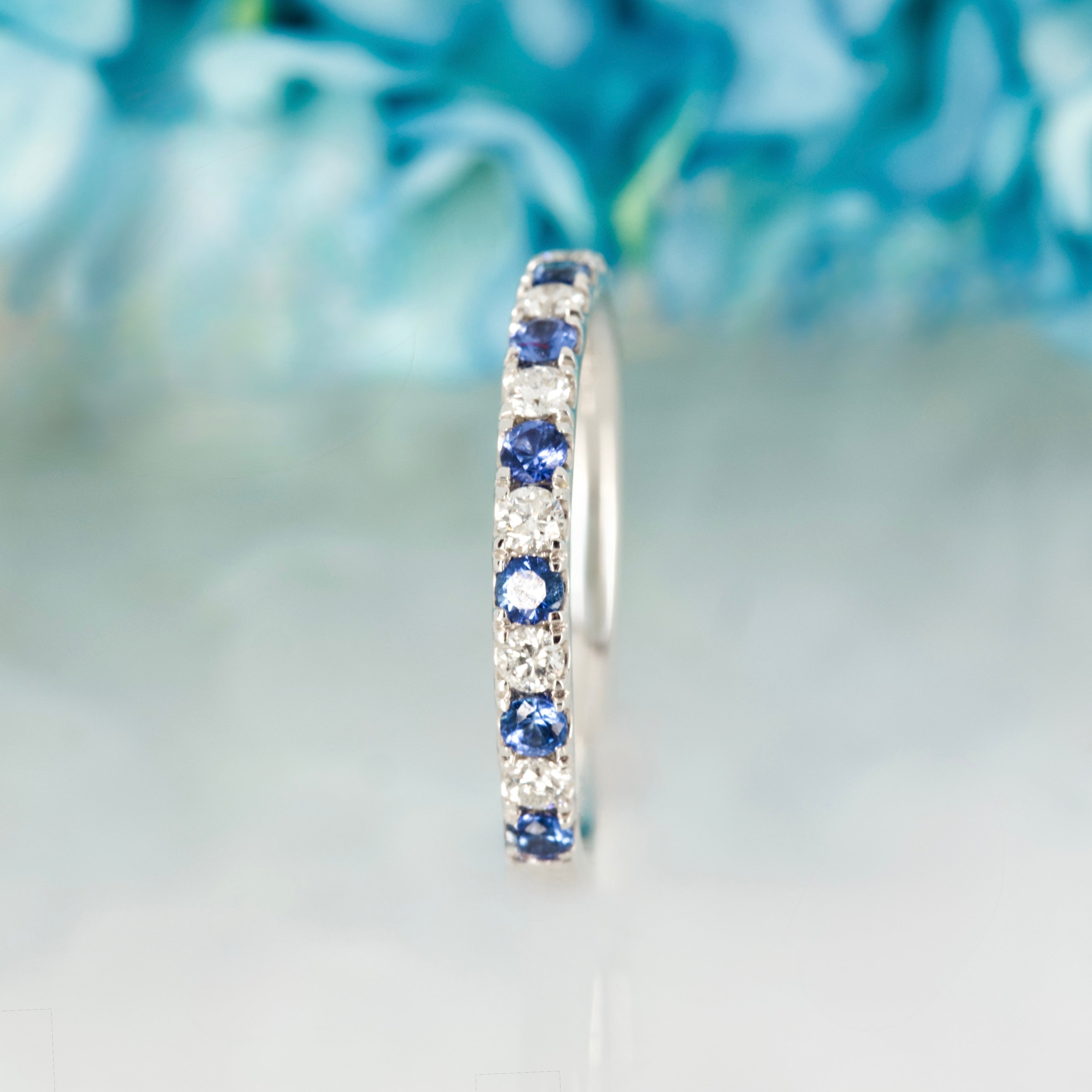 Platinum Round Cut Sapphire & Diamond Claw Set Half Eternity Ring