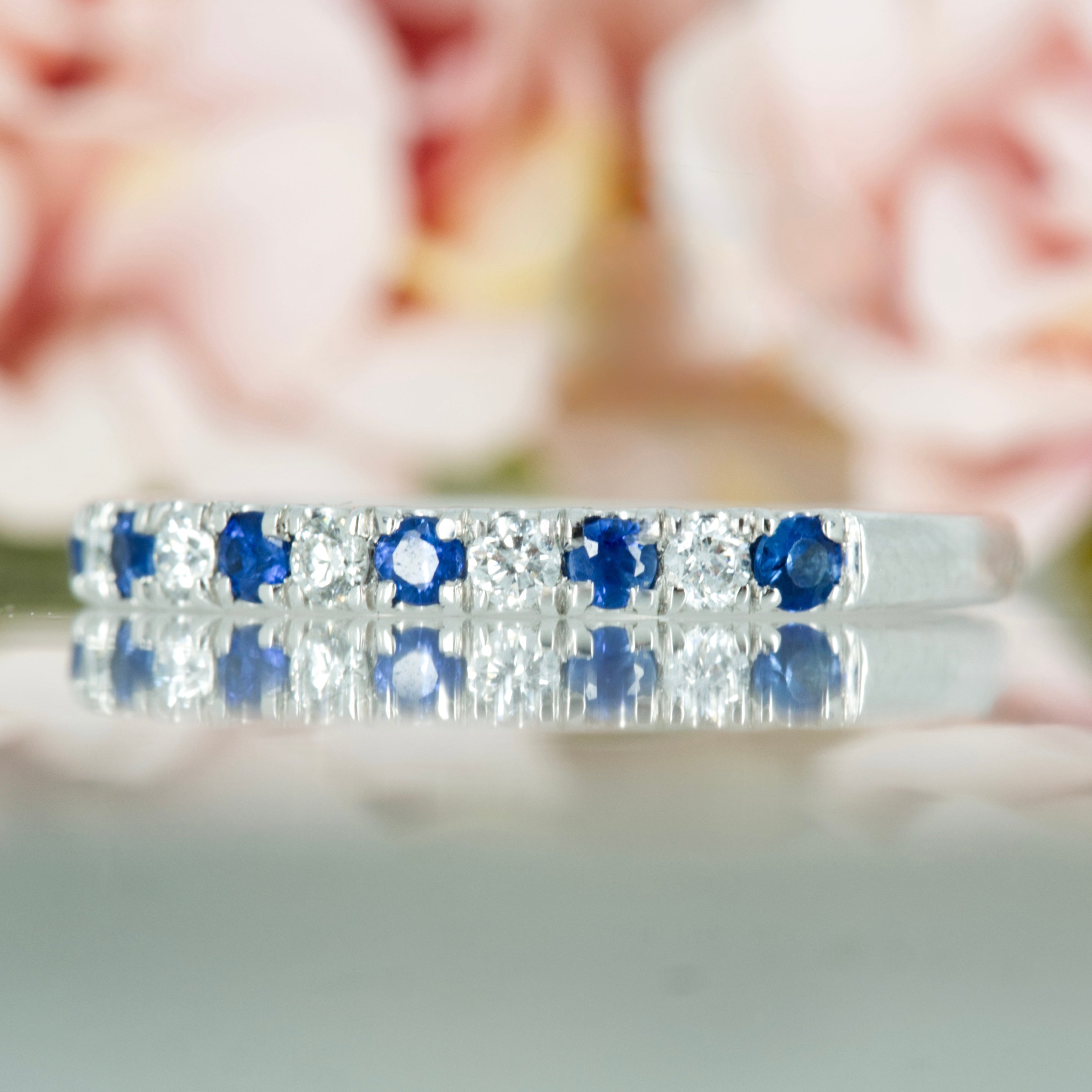 Platinum Round Cut Sapphire & Round Brilliant Cut Diamond Claw Set Half Eternity Ring