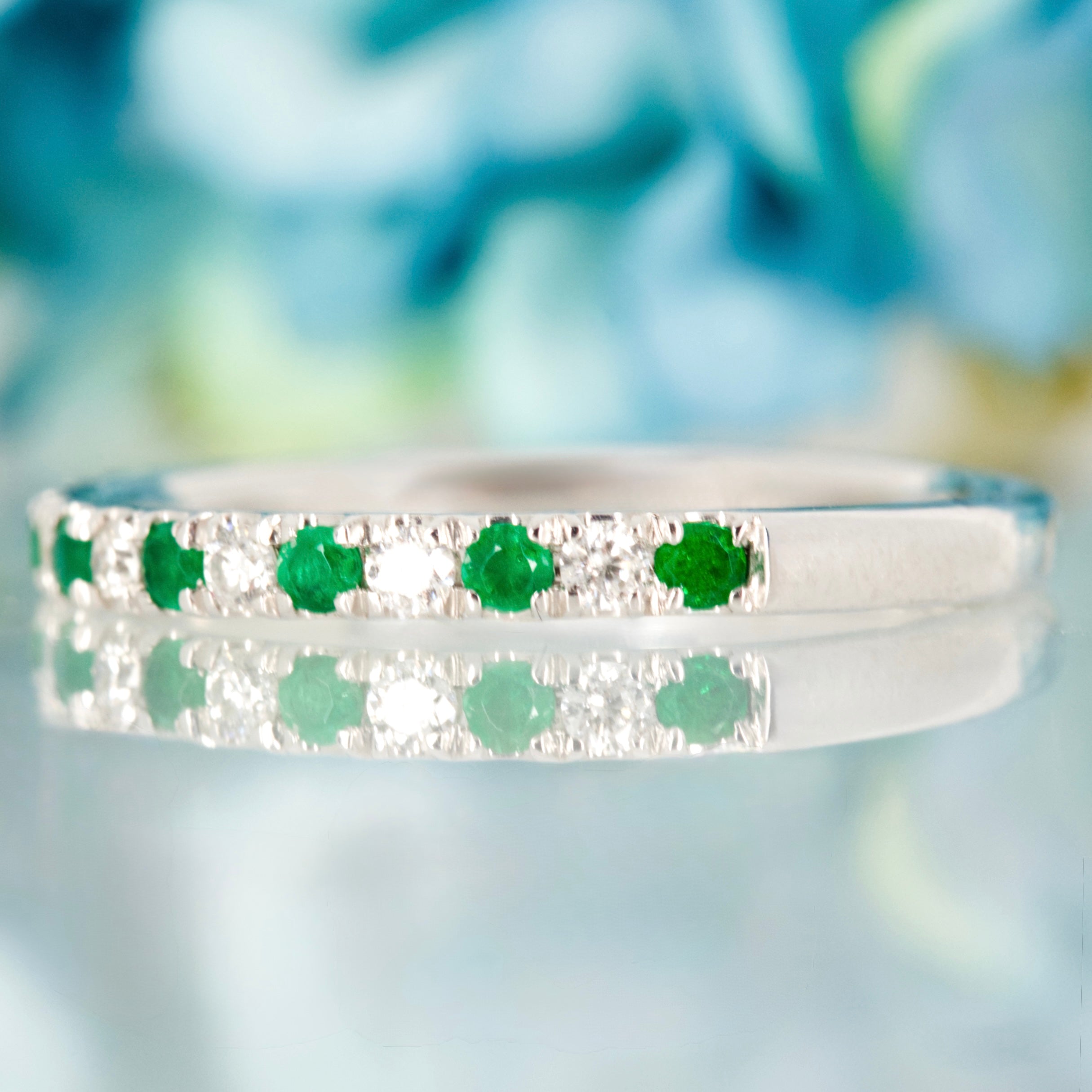 Platinum Round Cut Emerald & Diamond Claw Set Half Eternity Ring