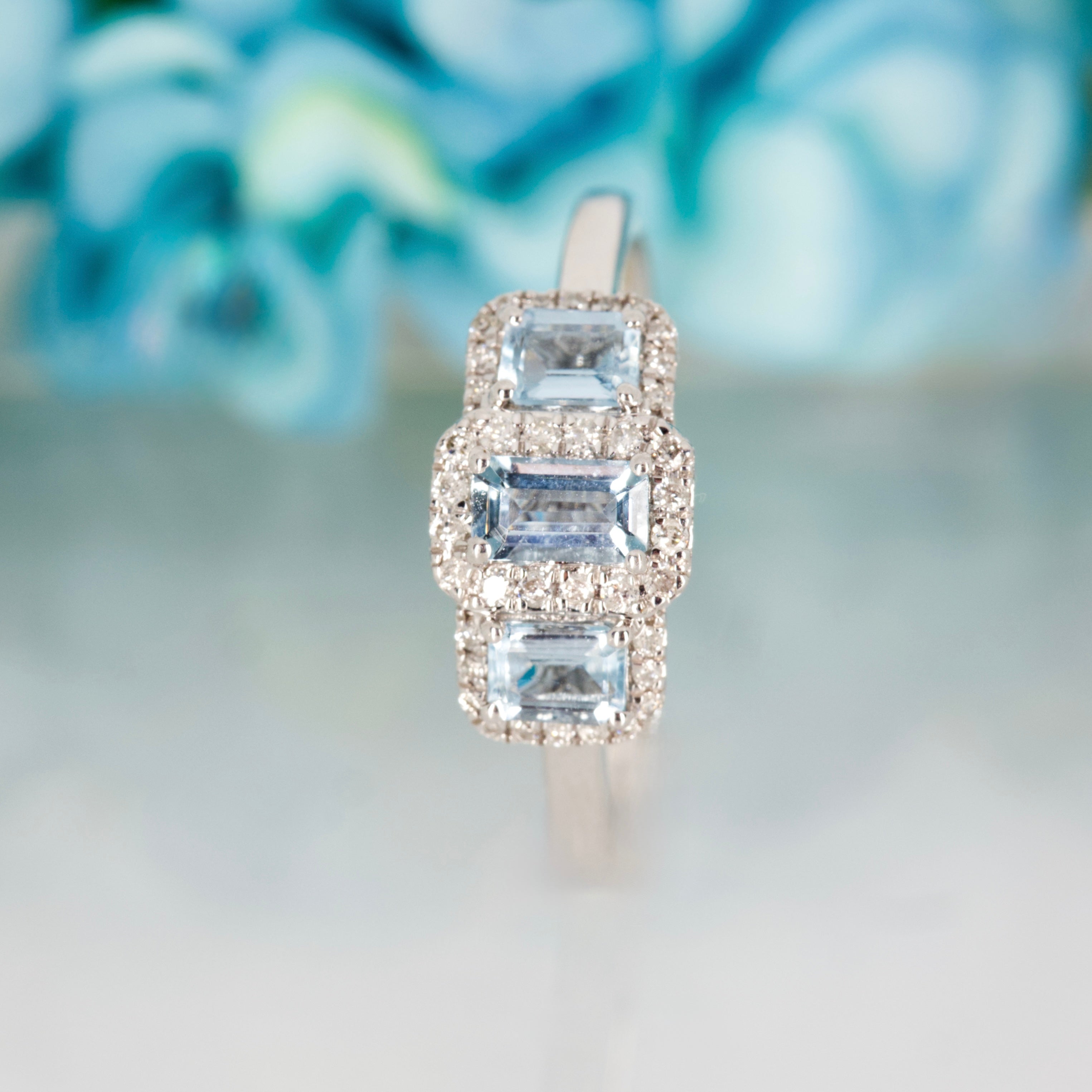 9ct White Gold Octagonal Cut Aquamarine & Round Brilliant Cut Diamond Triple Cluster Ring