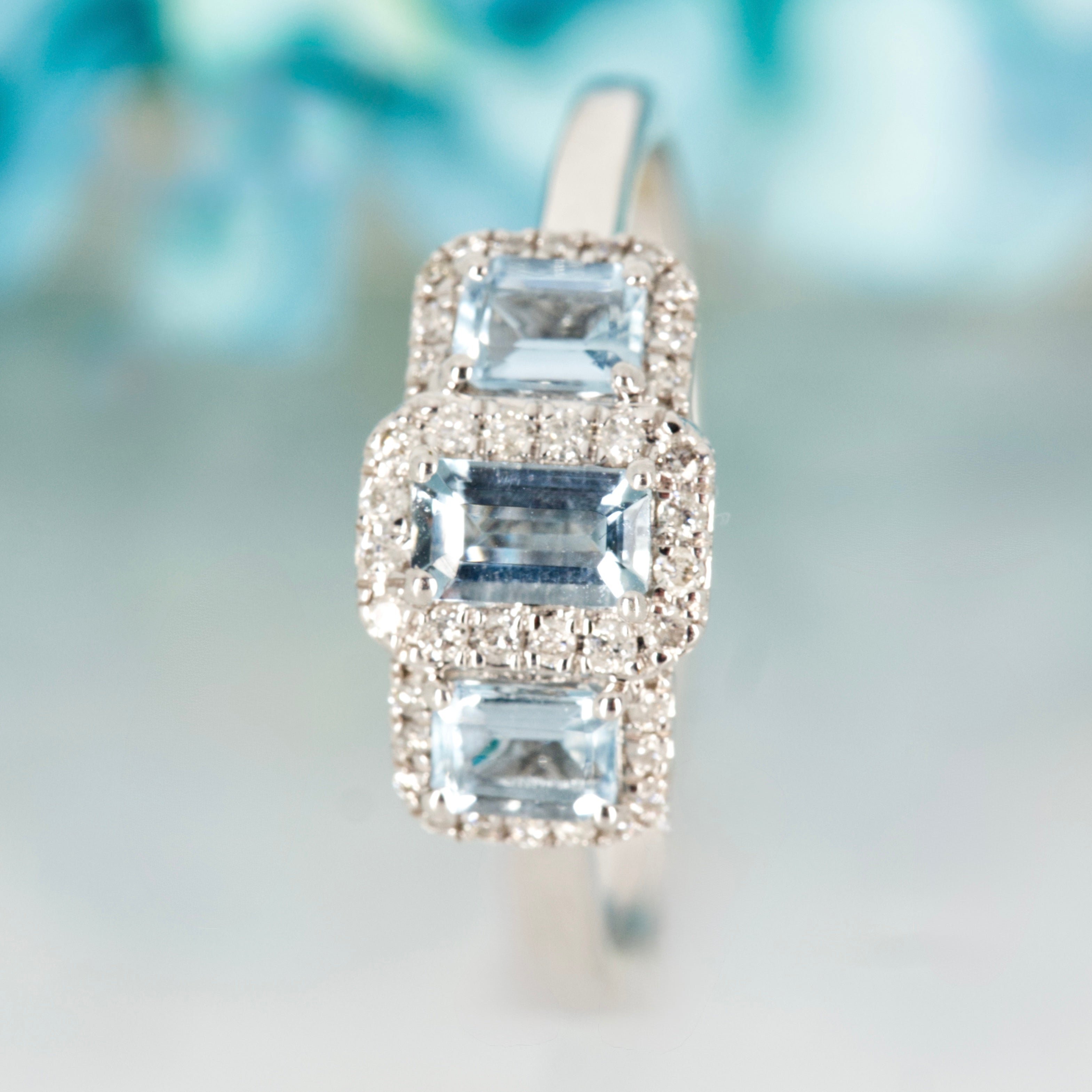 9ct White Gold Octagonal Cut Aquamarine & Round Brilliant Cut Diamond Triple Cluster Ring