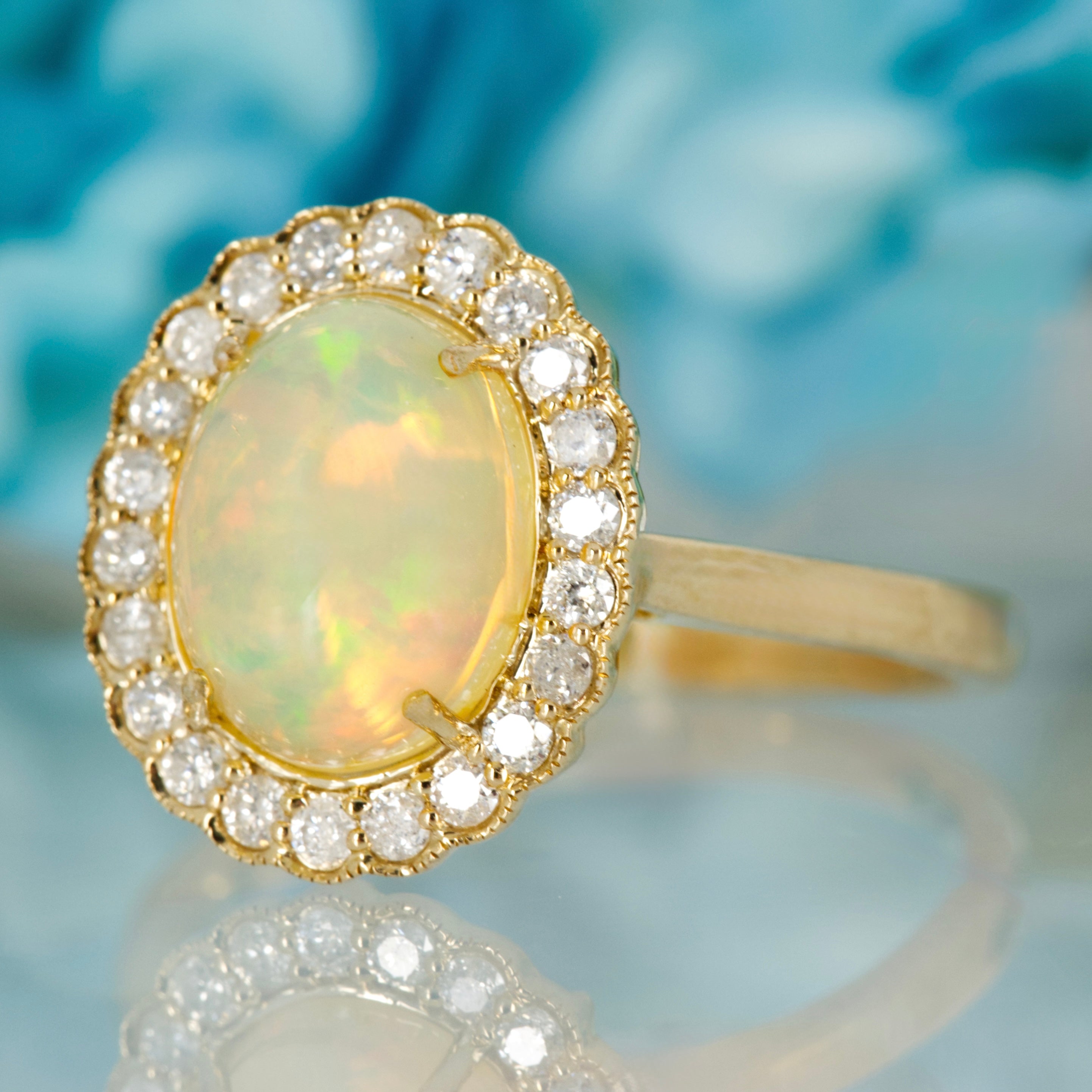 9ct Yellow Gold Oval Shaped Opal & Round Brilliant Cut Diamond Cluster Ring