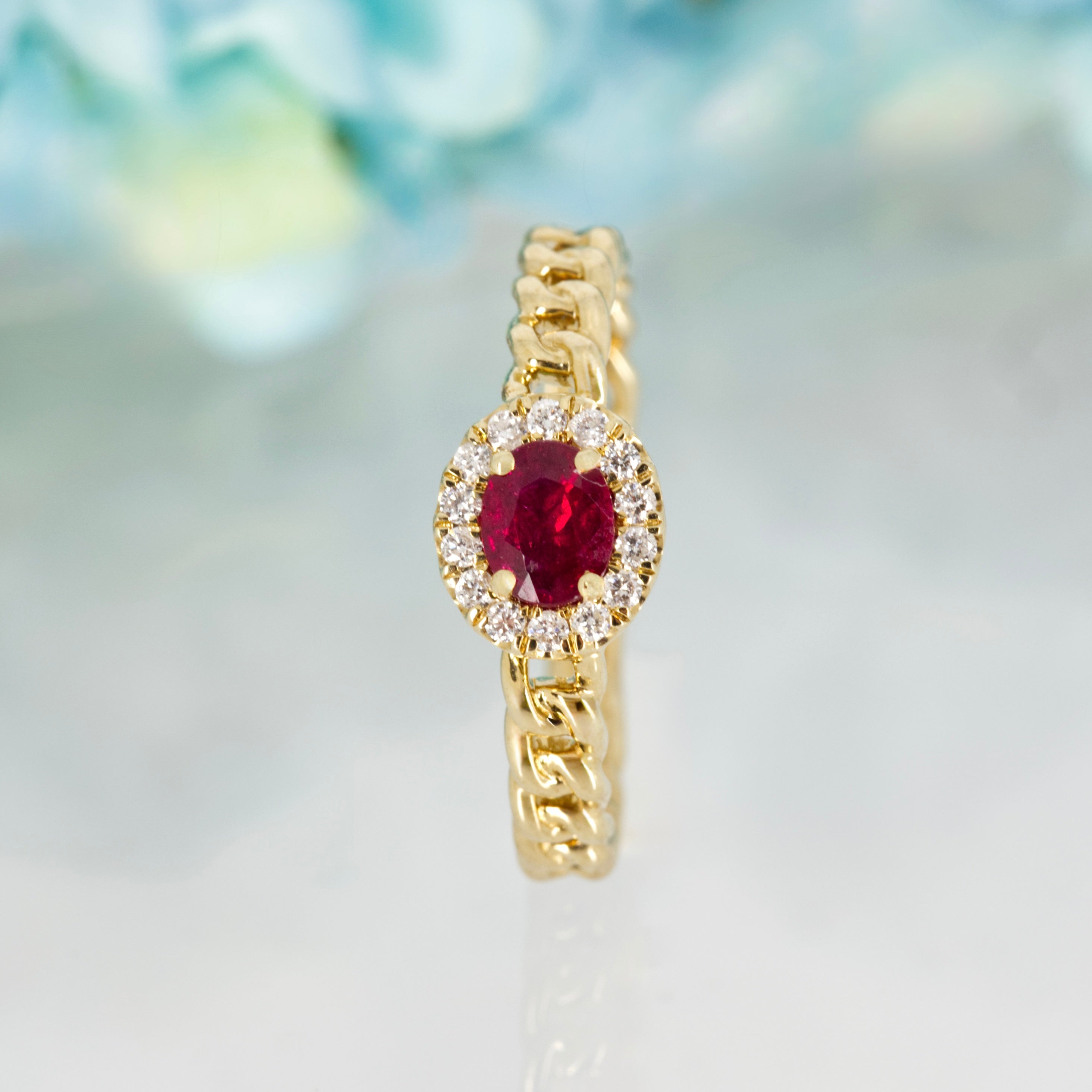 9ct Yellow Gold Oval Cut Ruby & Round Brilliant Cut Diamond Horizontal Halo Cluster Ring