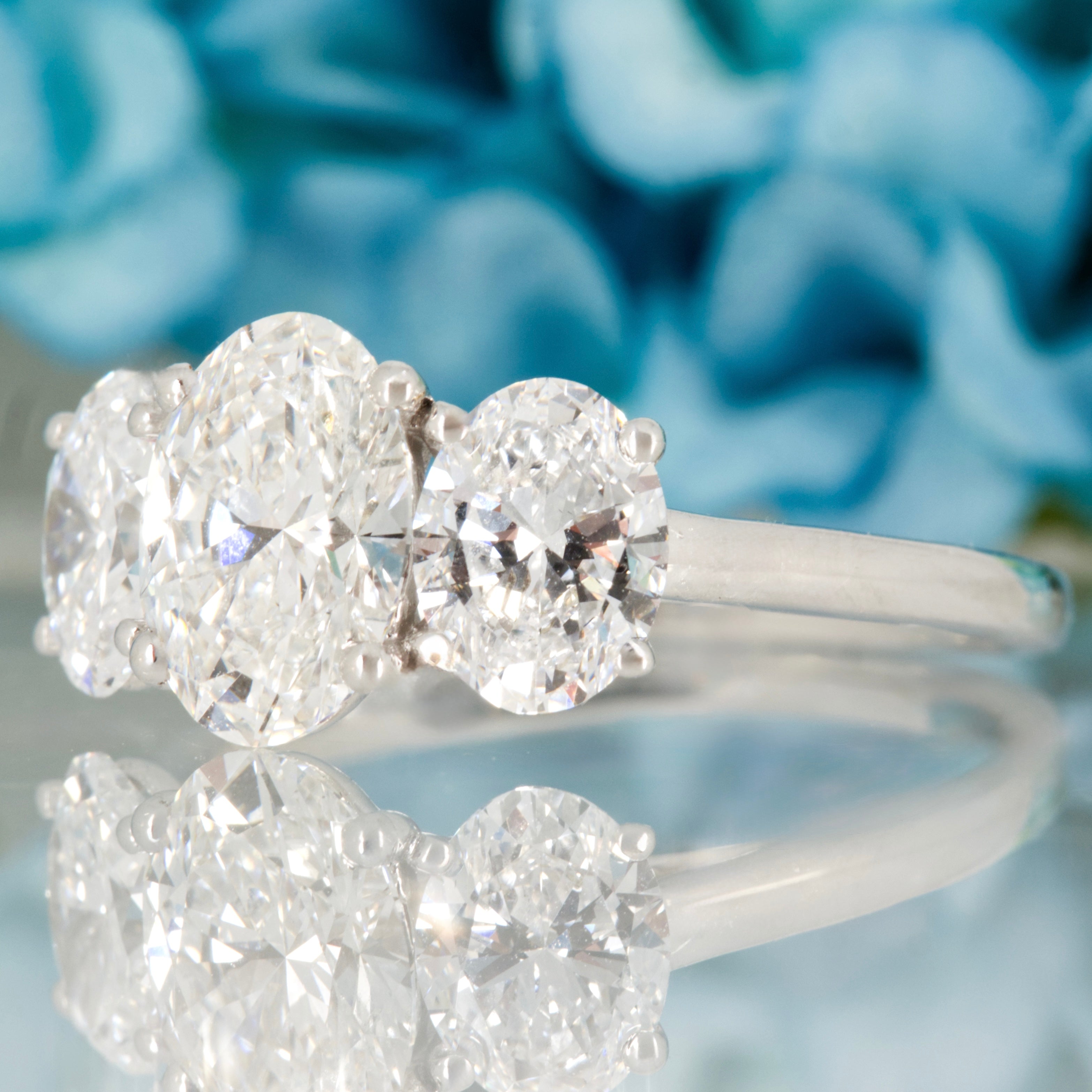 9ct White Gold 3.07ct Oval Cut Lab Grown Diamond Trilogy Ring