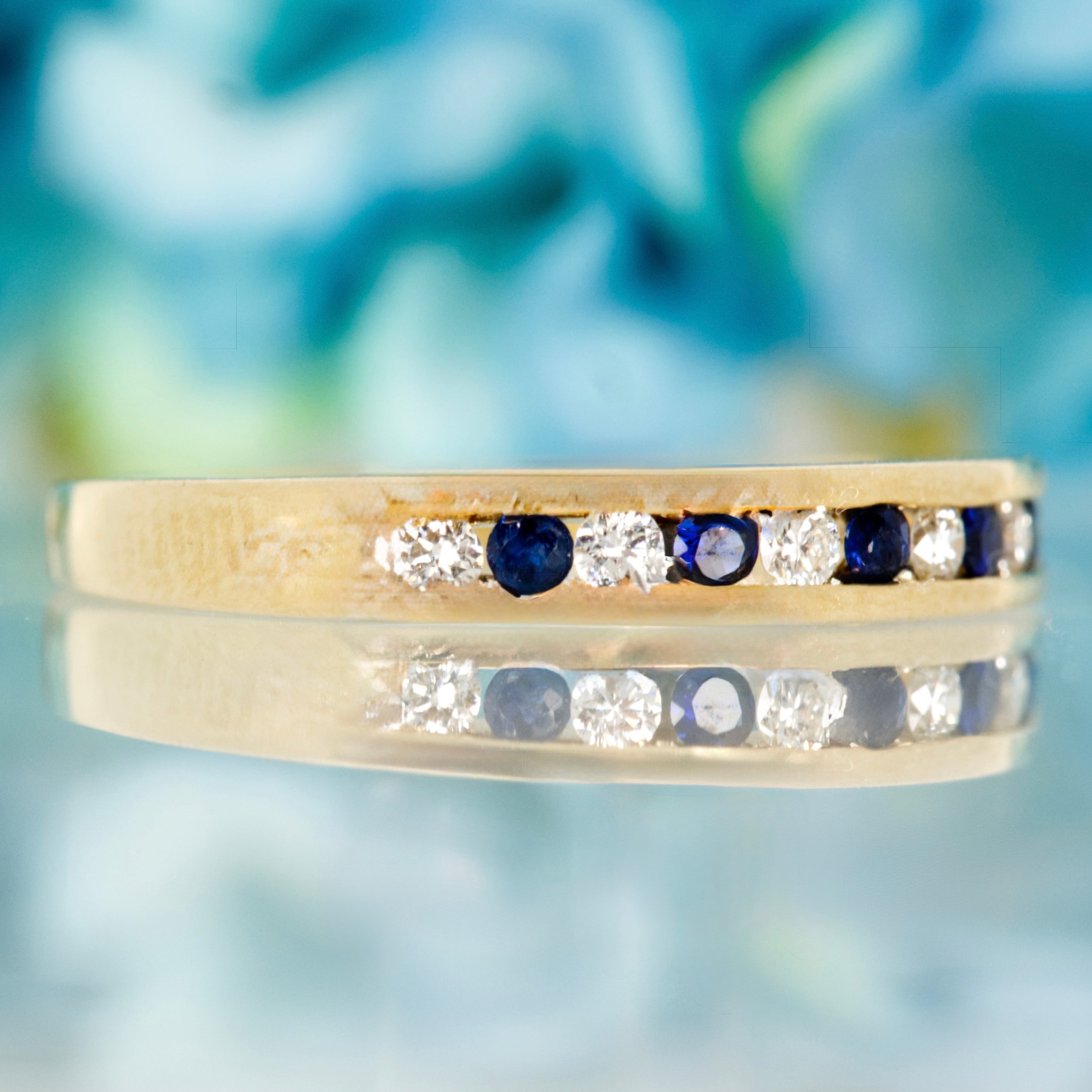 9ct Yellow Gold Round Cut Sapphire & Diamond Channel Set Half Eternity Ring