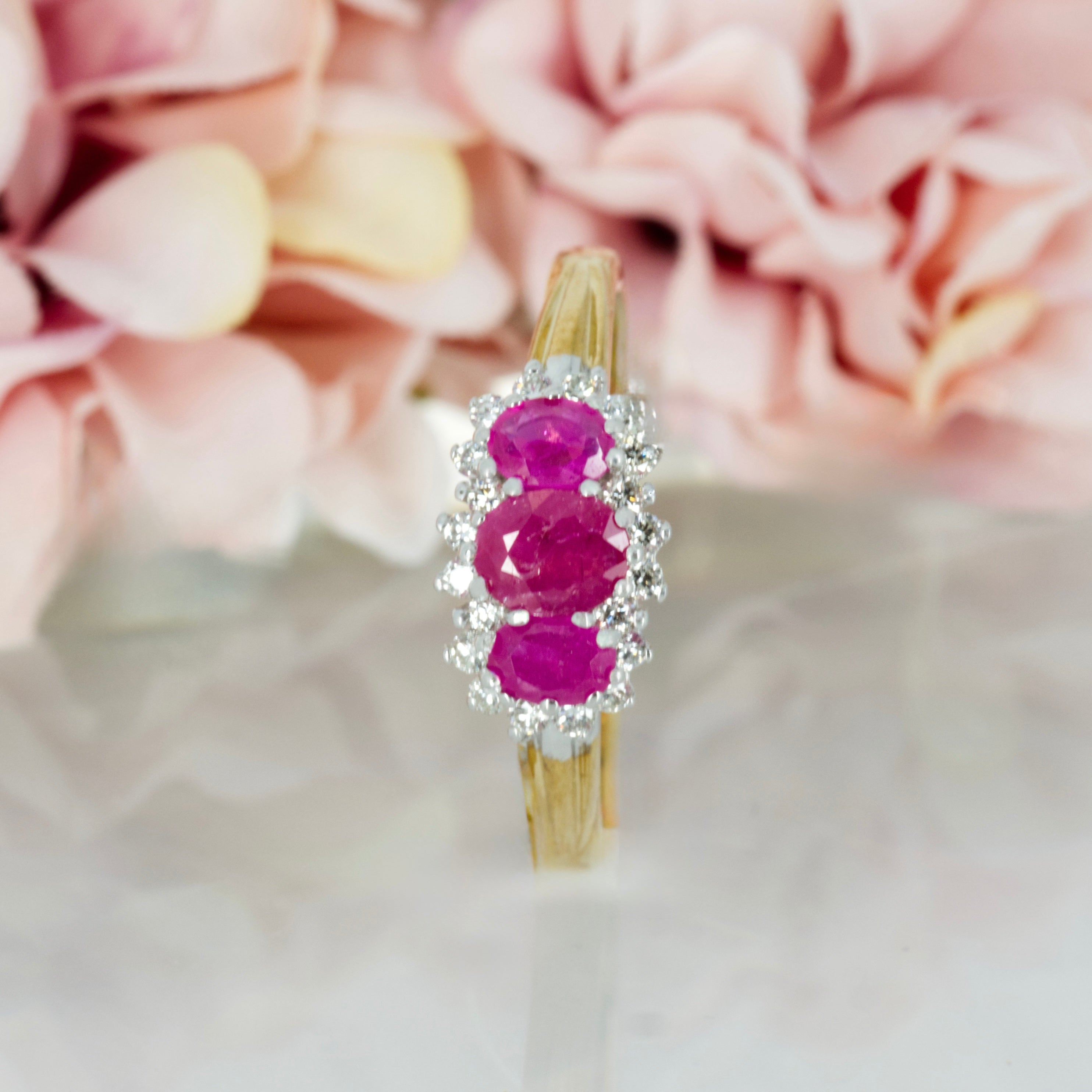 9ct Yellow Gold Oval Cut Ruby & Round Brilliant Cut Diamond Cluster Ring