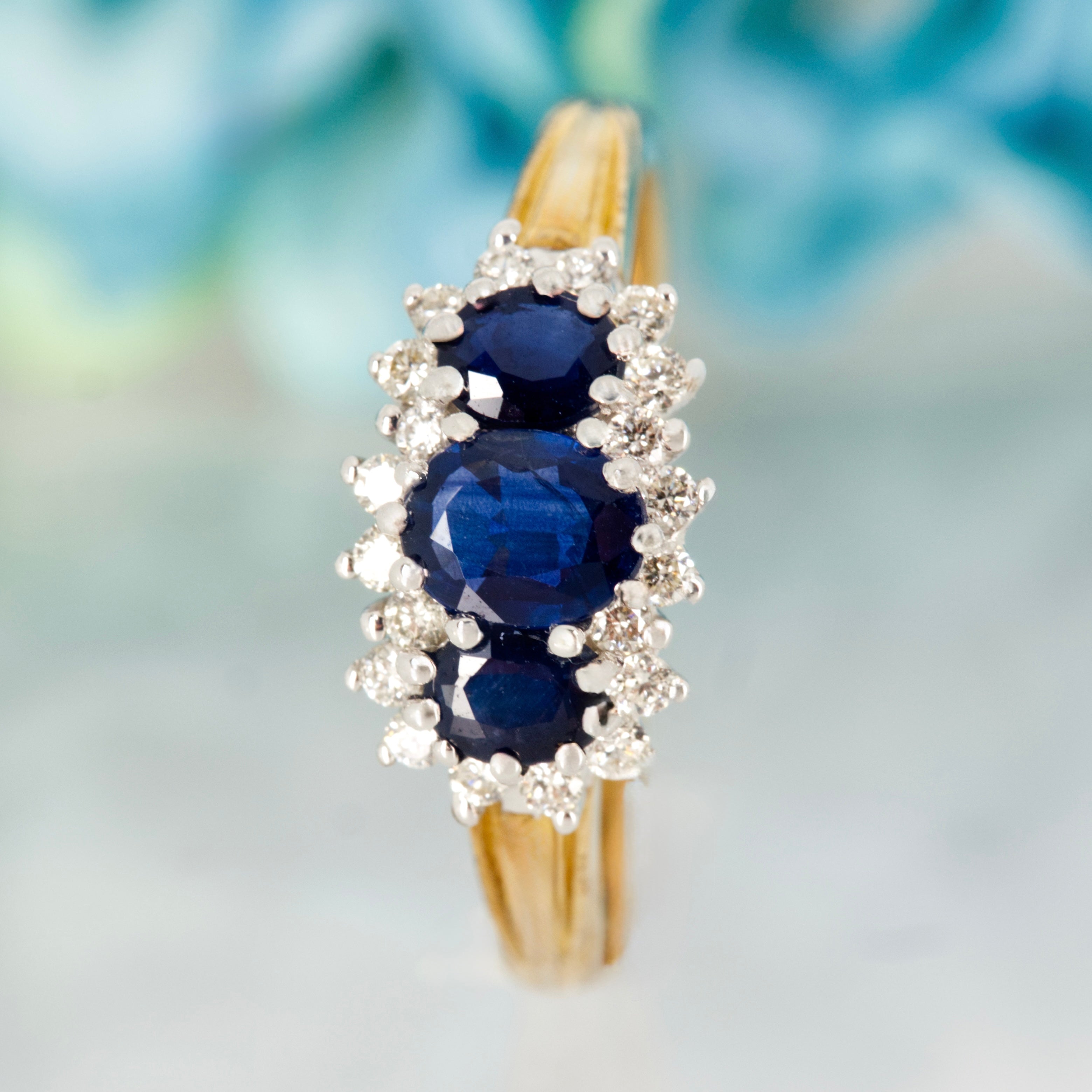 9ct Yellow Gold Oval Cut Sapphire & Round Brilliant Cut Diamond Triple Cluster Ring