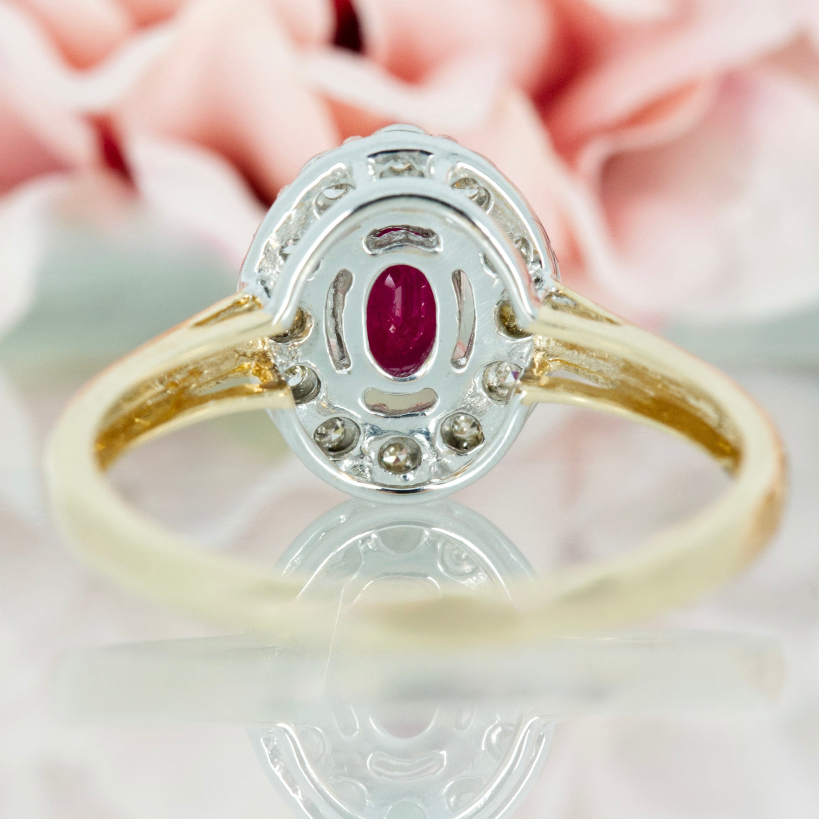9ct Yellow Gold Oval Cut Ruby & Round Brilliant Cut Diamond Halo Cluster Ring
