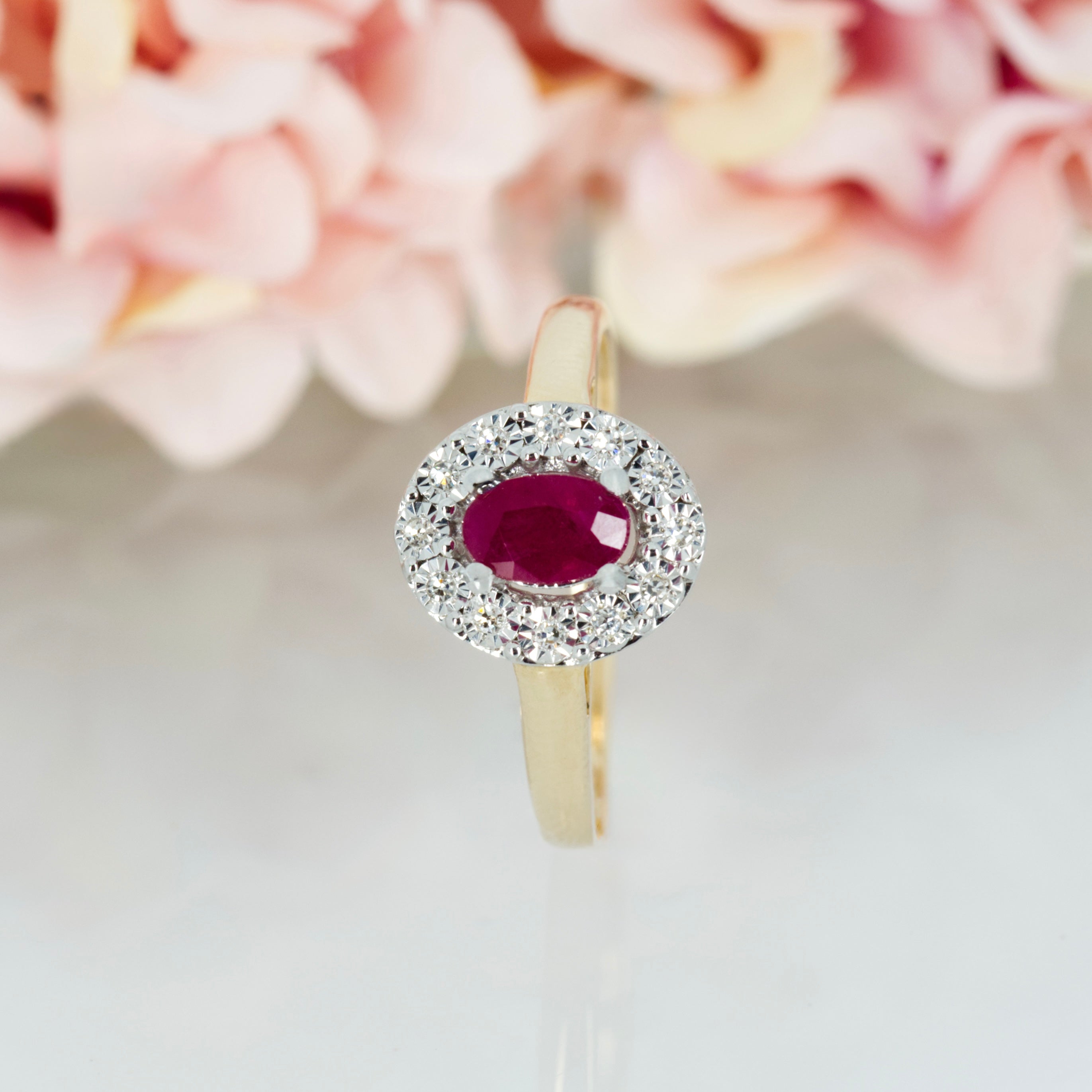 9ct Yellow Gold Oval Cut Ruby & Round Brilliant Cut Diamond Halo Cluster Ring