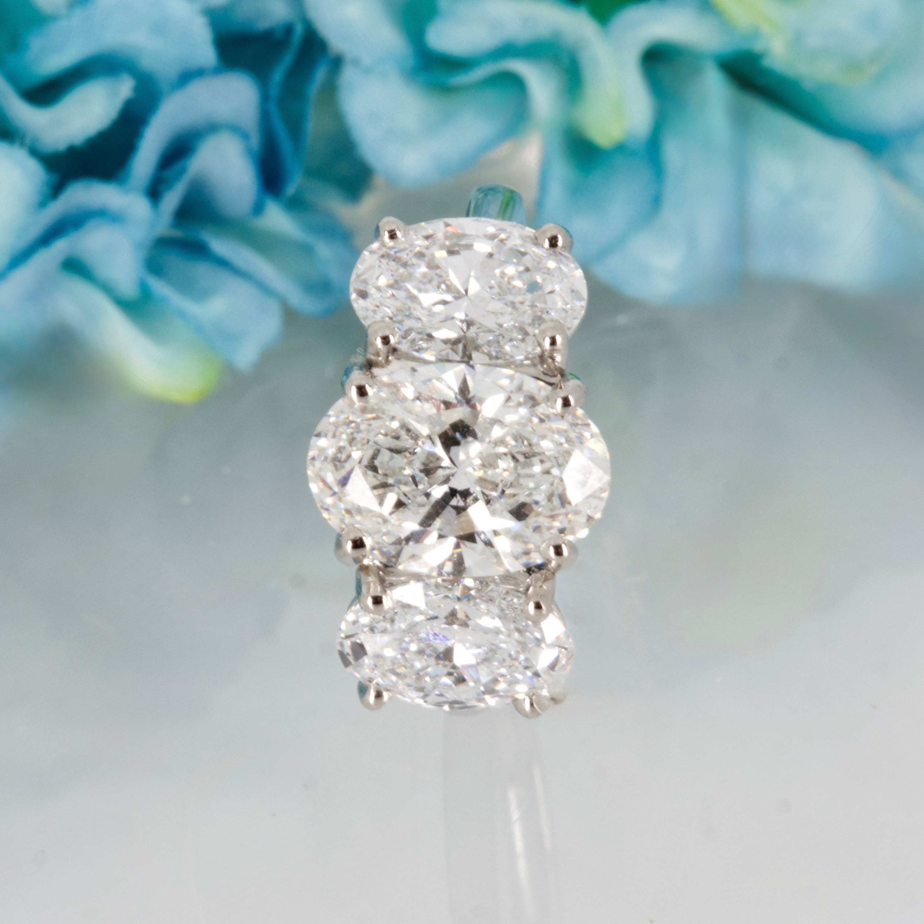 Platinum 5.04ct Oval Cut Lab Grown Diamond Trilogy Ring