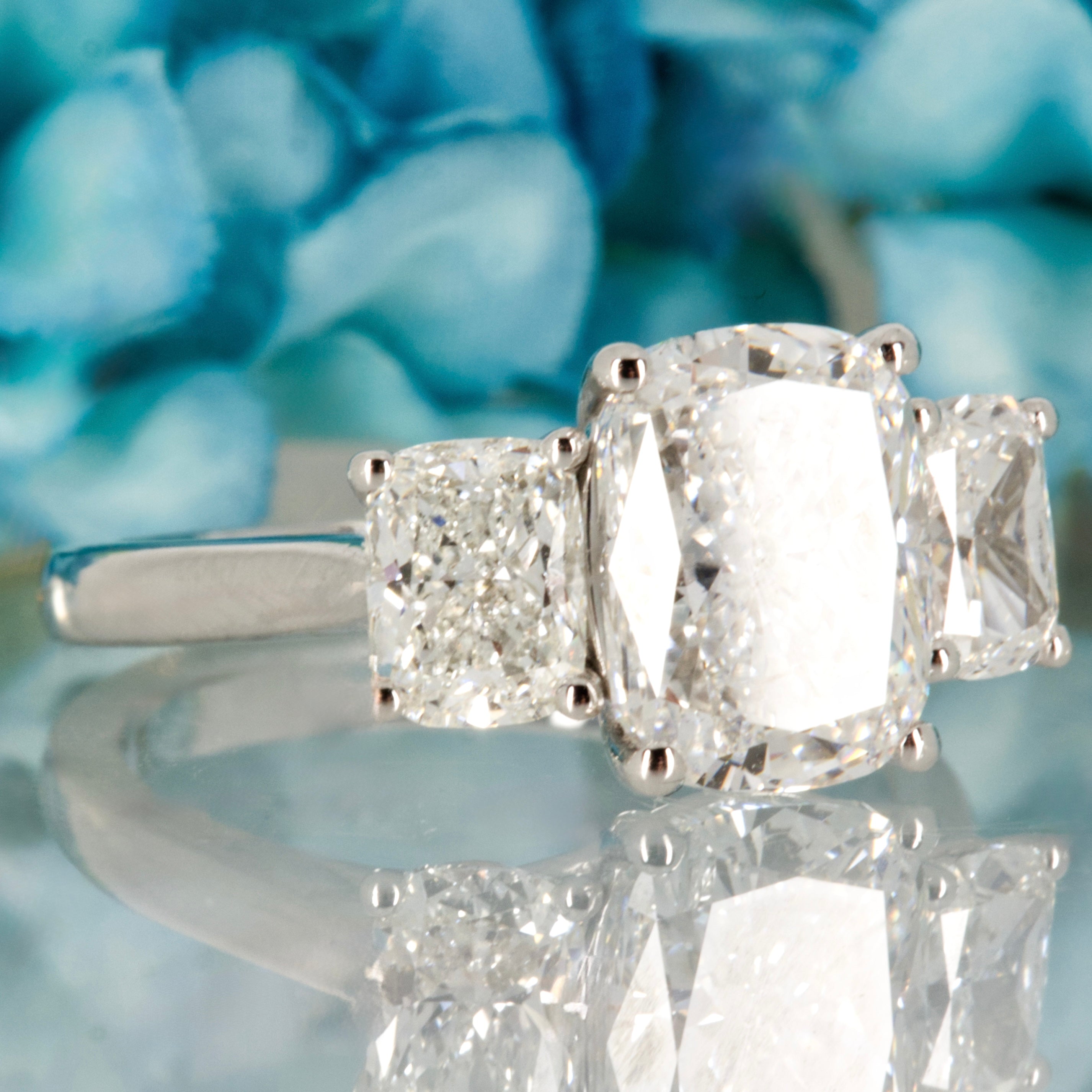 Platinum 4.29ct Cushion Cut Lab Grown Diamond Trilogy Ring
