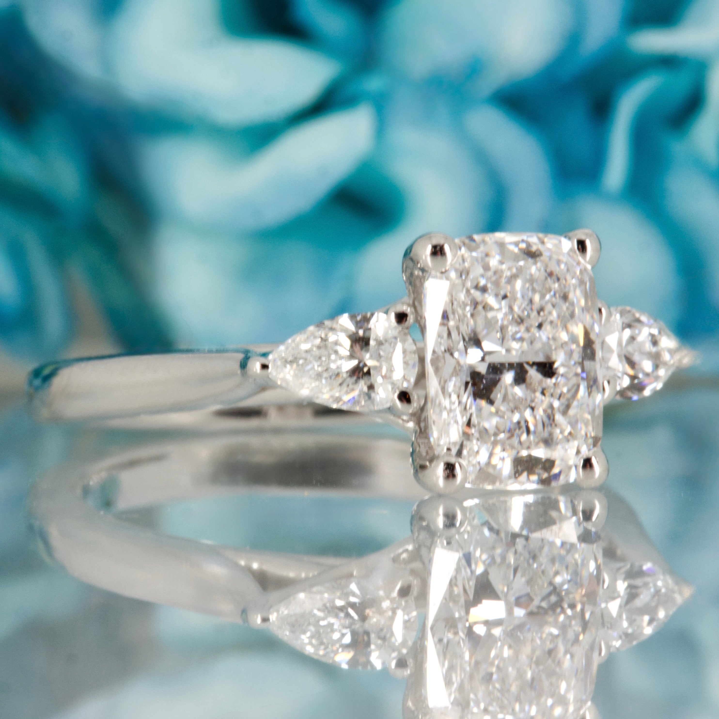 Platinum 1.83ct Cushion & Pear Cut Lab Grown Diamond Trilogy Ring