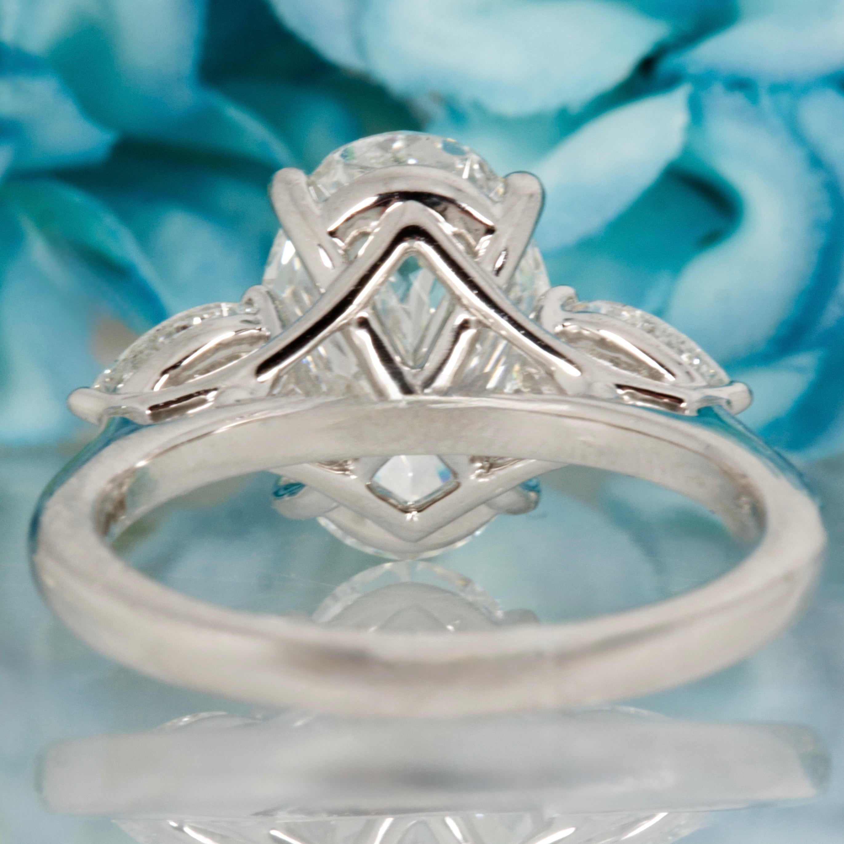 Platinum 3.69ct Oval & Pear Cut Lab Grown Diamond Trilogy Ring