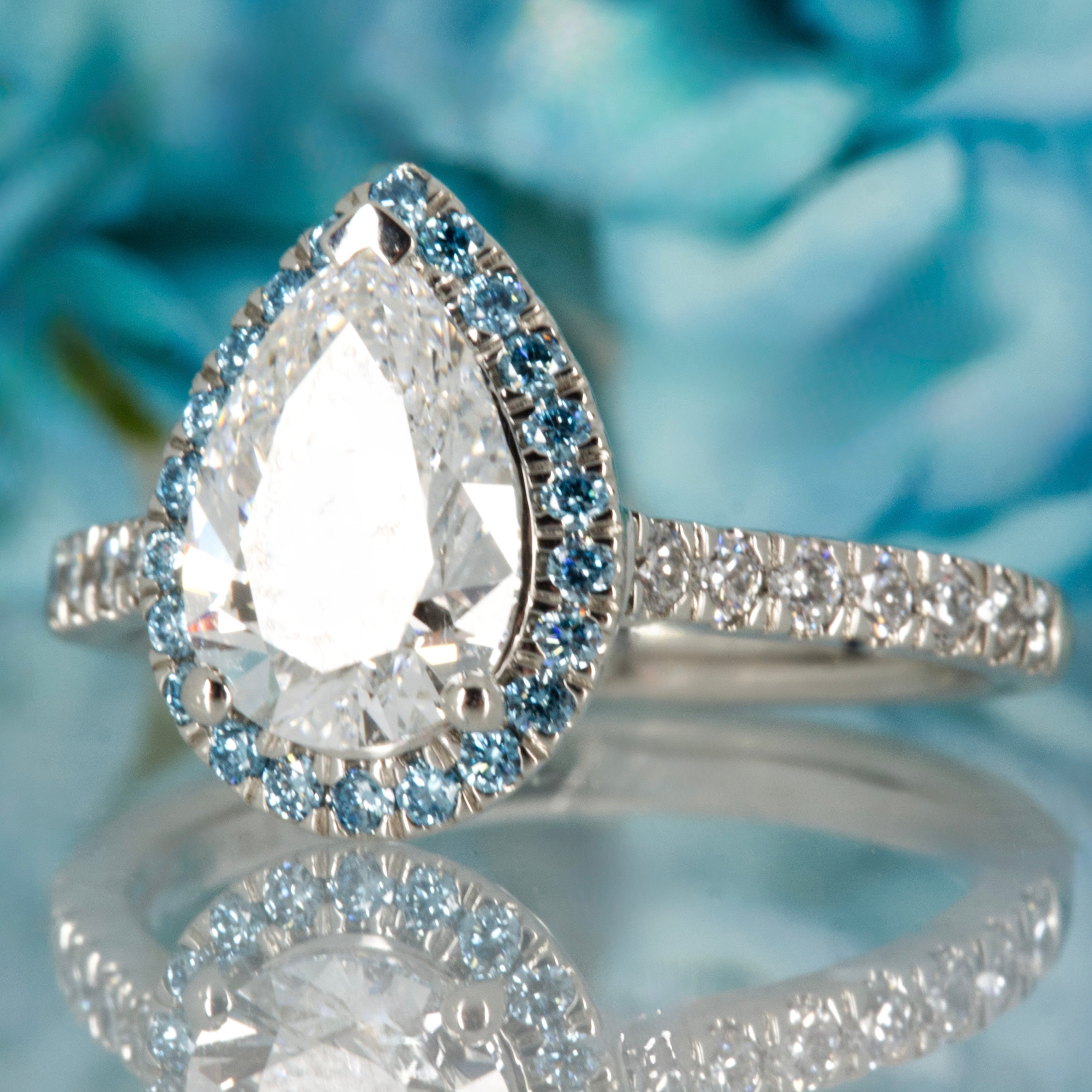 Platinum Pear & Round Brilliant Cut Lab Grown Diamond Halo Cluster Ring