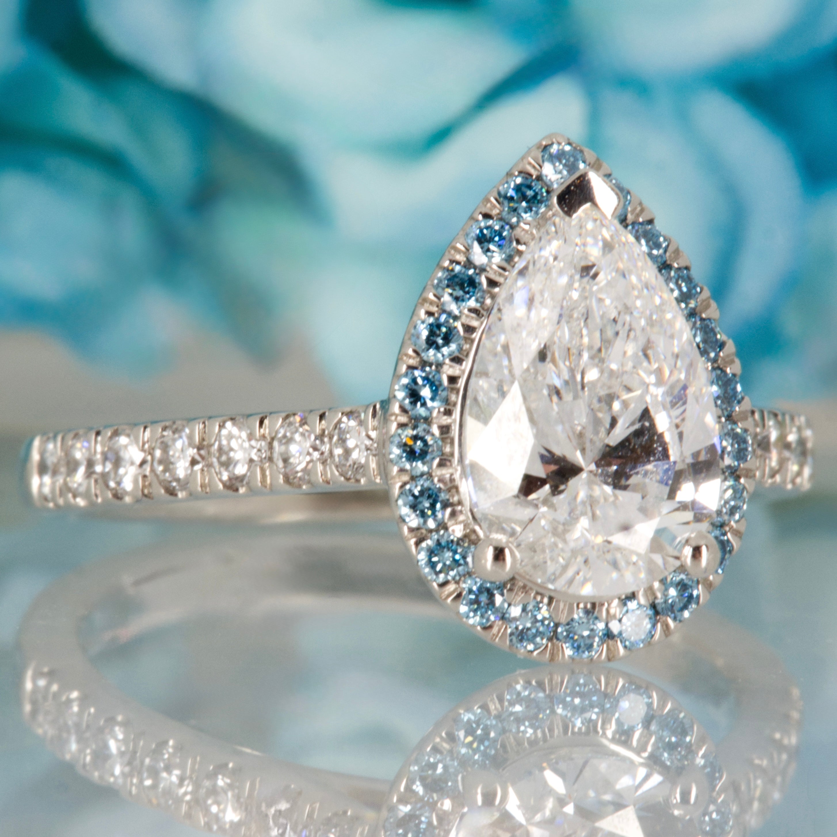 Platinum Pear & Round Brilliant Cut Lab Grown Diamond Halo Cluster Ring