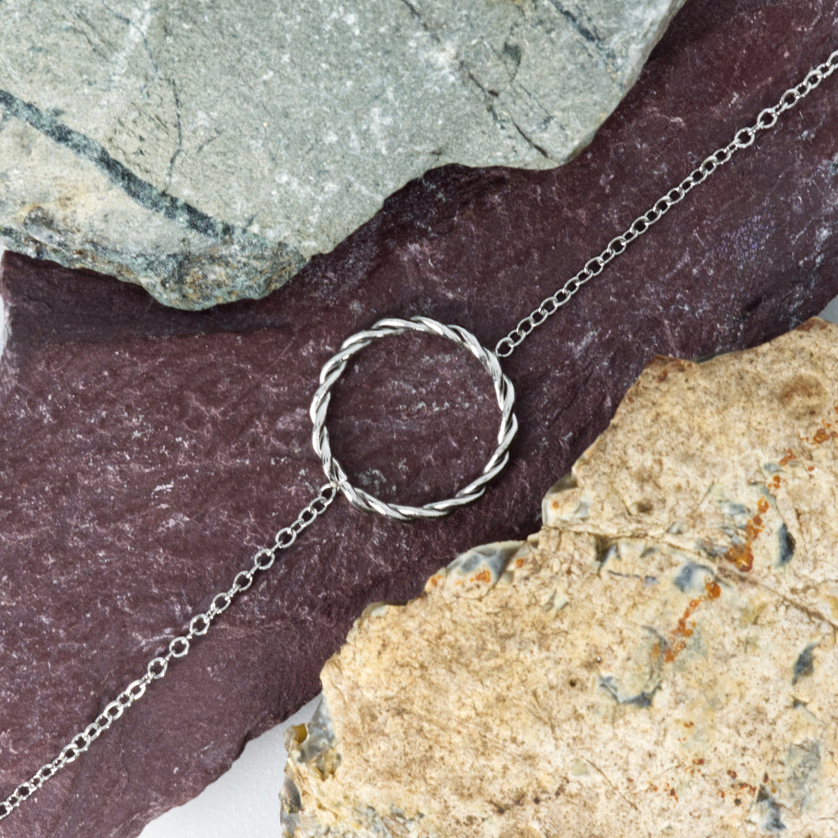Rhodium Plated Twisted Circle Bracelet
