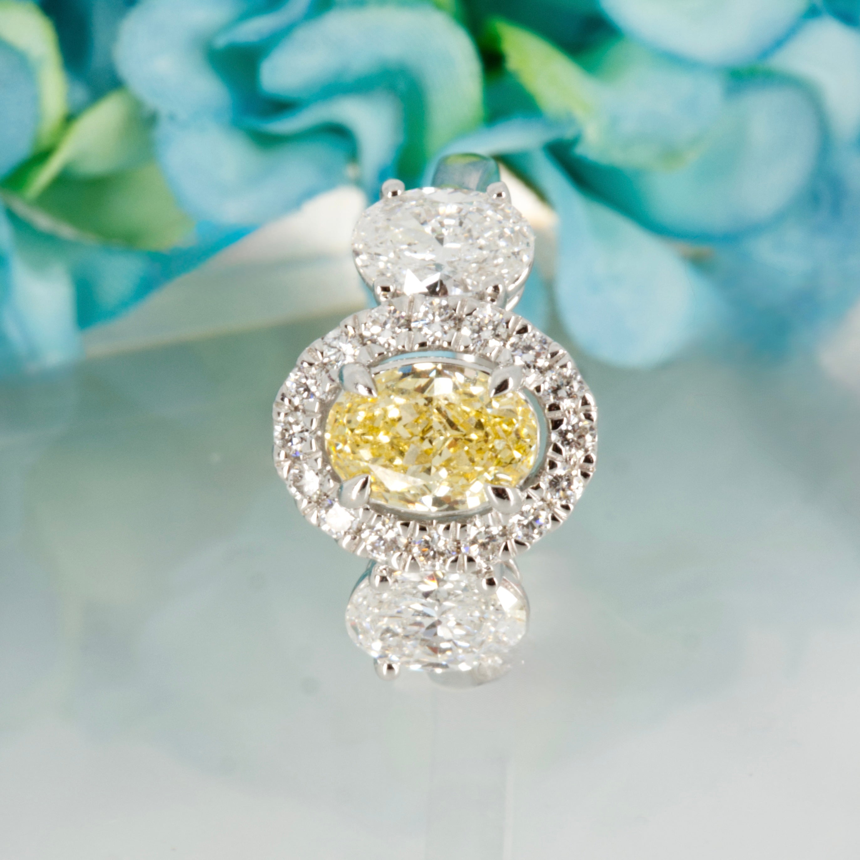18ct White Gold Oval Cut Lab Grown Yellow Diamond & Lab Grown Diamond Halo Cluster Trilogy Ring