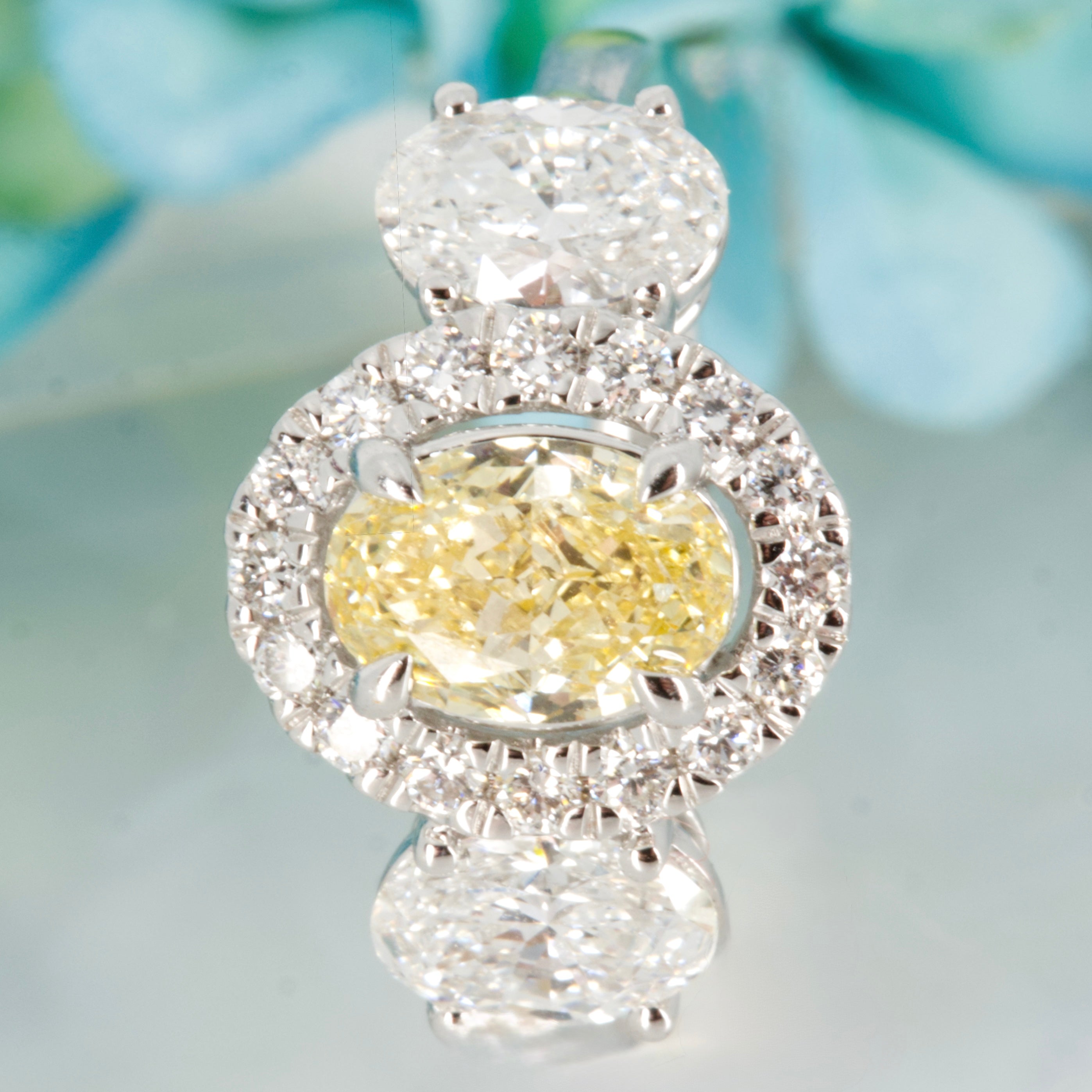 18ct White Gold Oval Cut Lab Grown Yellow Diamond & Lab Grown Diamond Halo Cluster Trilogy Ring