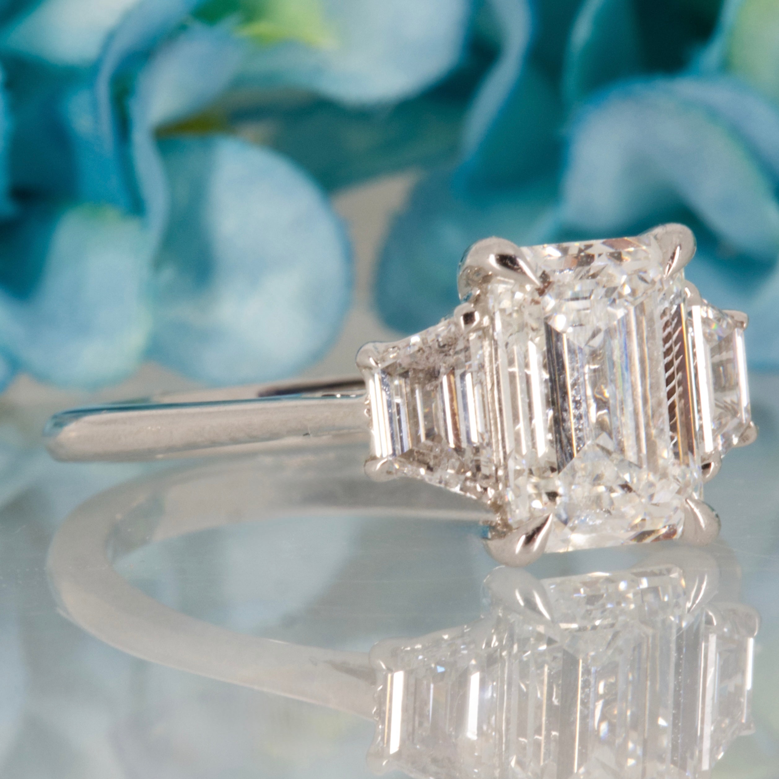 Platinum 2.63ct Emerald & Trapezoid Cut Lab Grown Diamond Trilogy Ring