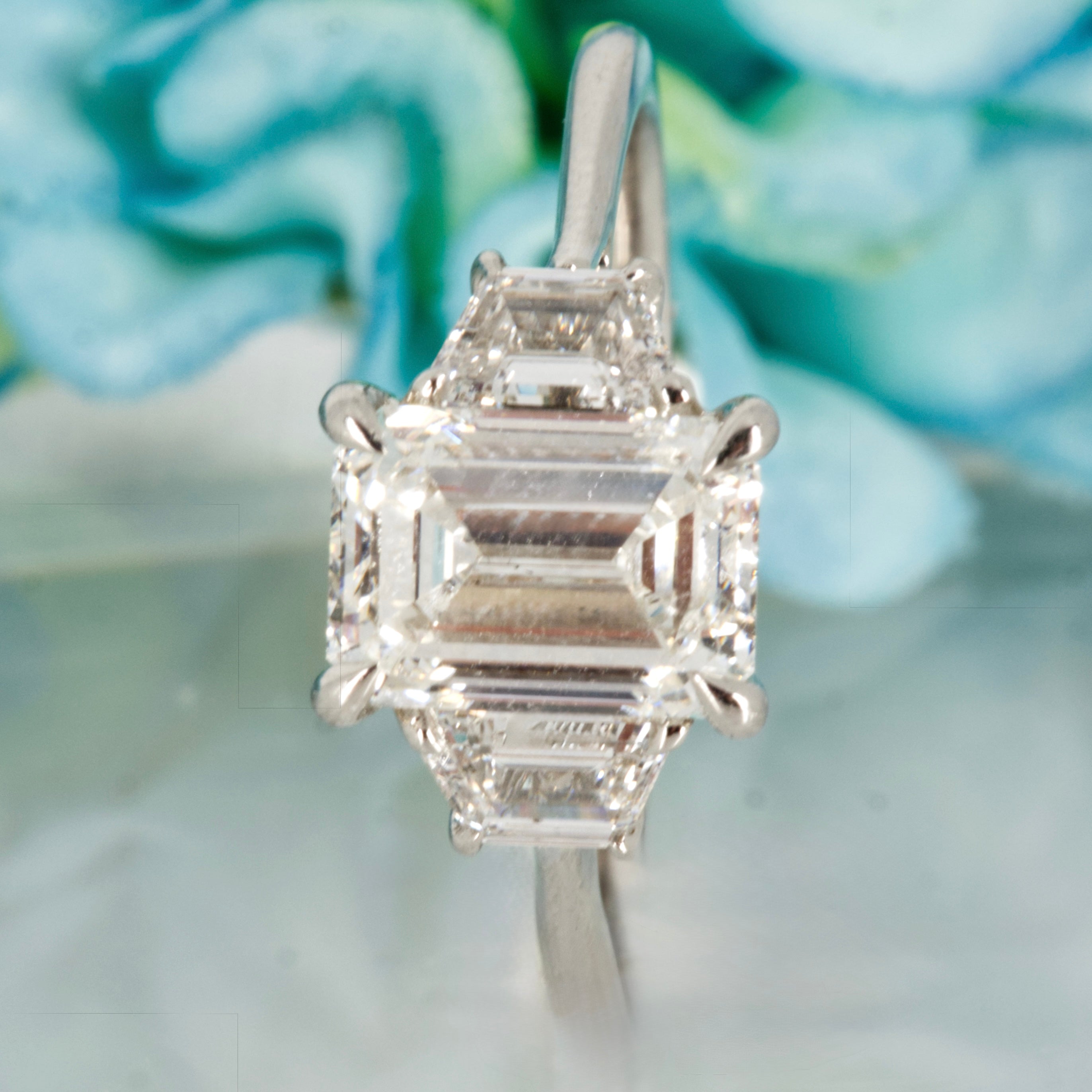 Platinum 2.63ct Emerald & Trapezoid Cut Lab Grown Diamond Trilogy Ring