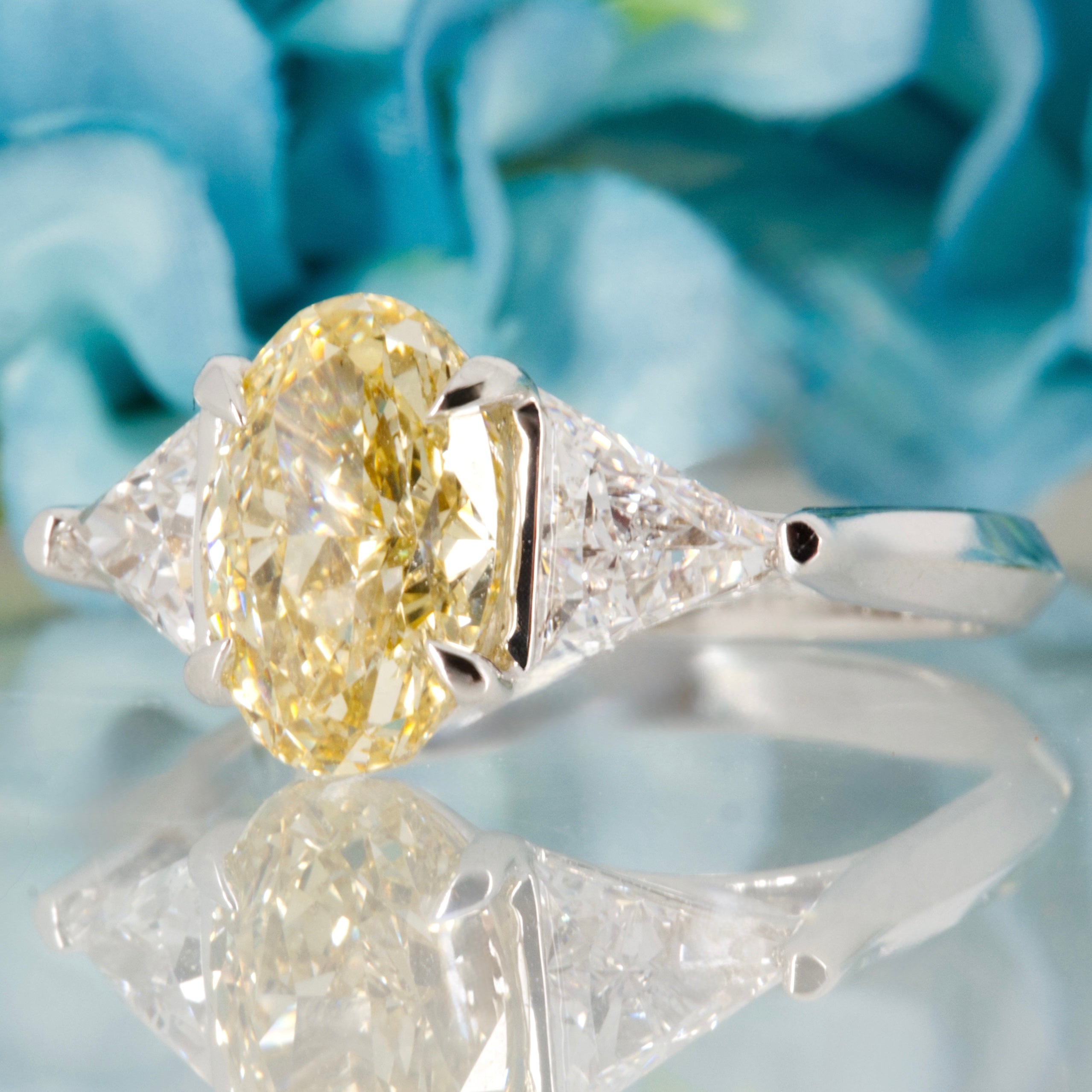 18ct White Gold Oval Cut Lab Grown Yellow Diamond & Trilliant Cut Lab Grown Diamond Trilogy Ring