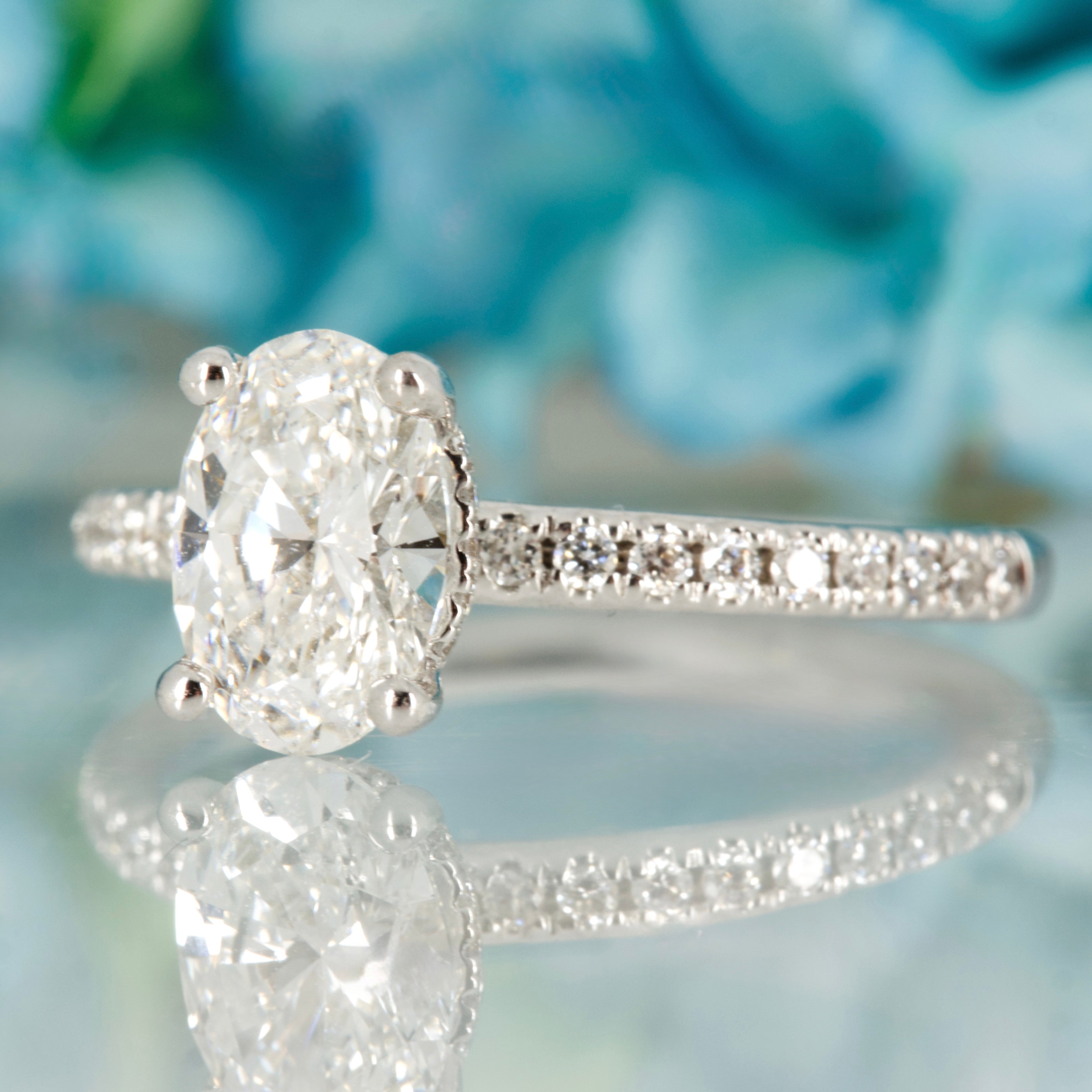18ct White Gold 1.10ct Oval Cut Lab Grown Diamond Solitaire Ring with Lab Grown Diamond Shoulders