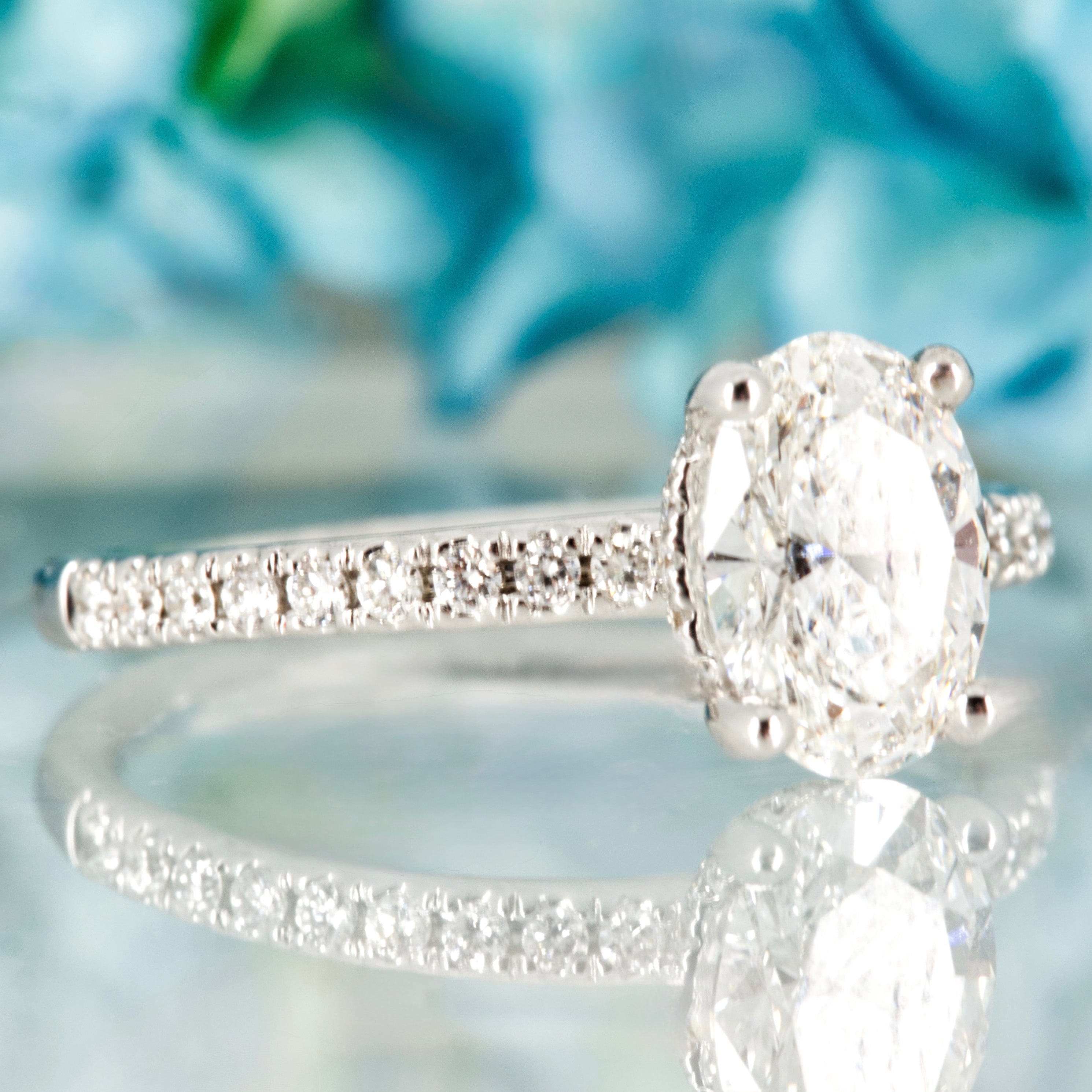 18ct White Gold 1.10ct Oval Cut Lab Grown Diamond Solitaire Ring with Lab Grown Diamond Shoulders