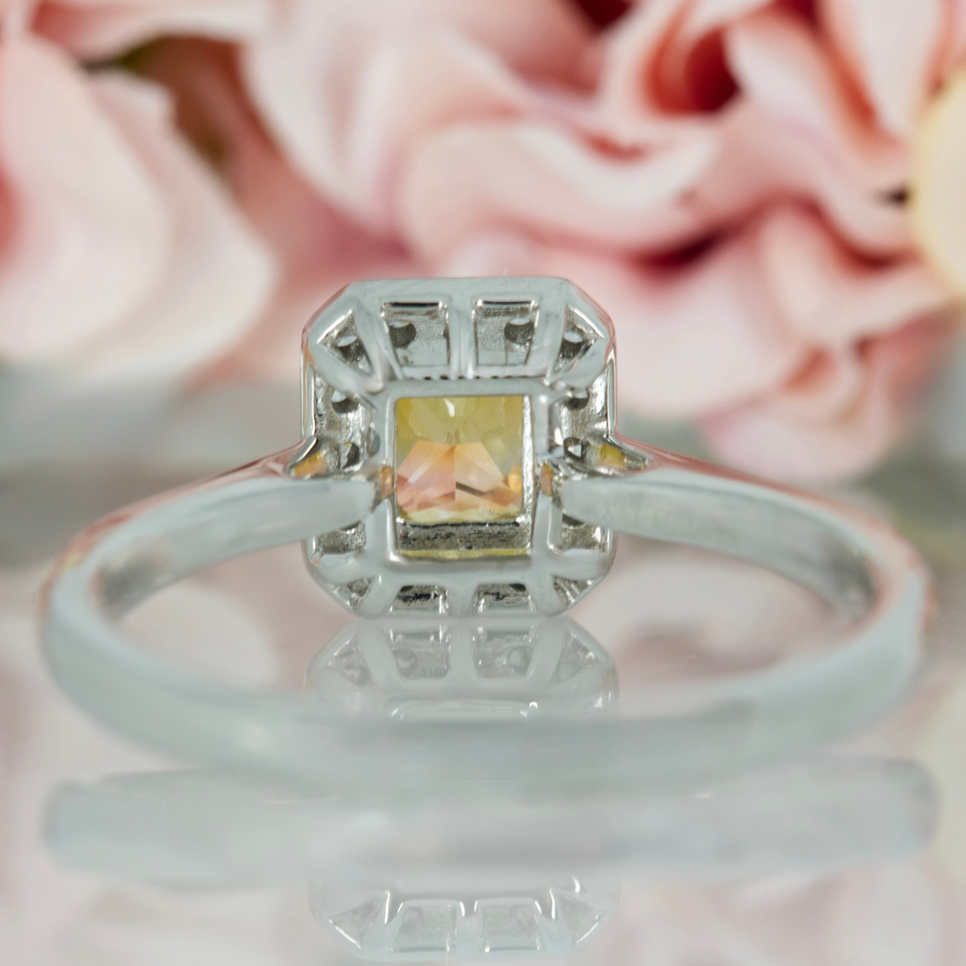 Platinum Radiant Cut Yellow Sapphire & Round Brilliant Cut Diamond Halo Cluster Ring