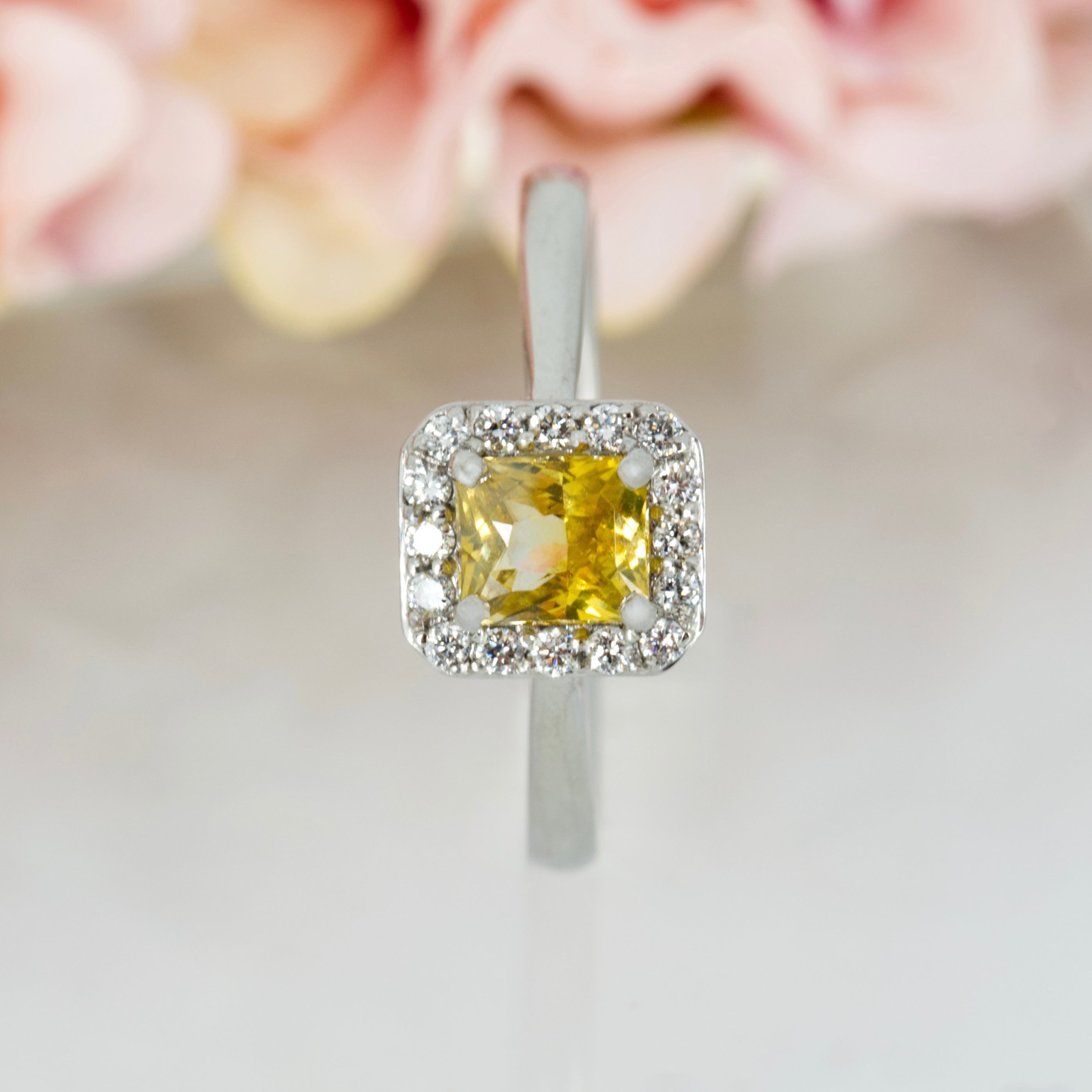 Platinum Radiant Cut Yellow Sapphire & Round Brilliant Cut Diamond Halo Cluster Ring