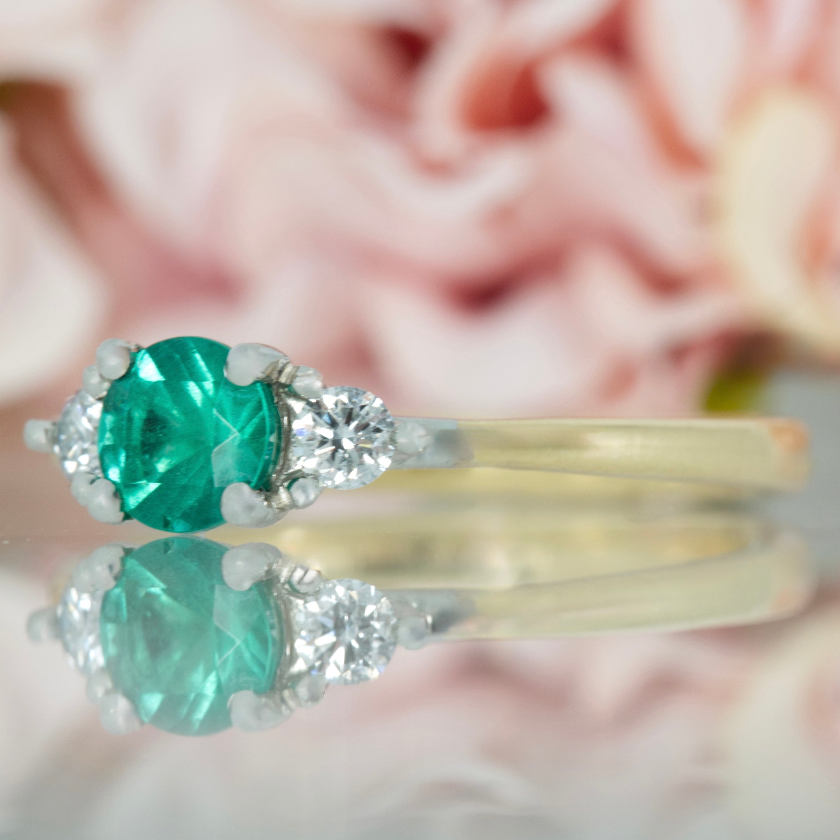 18ct Yellow Gold & Platinum Round Cut Emerald & Round Brilliant Cut Diamond Trilogy Ring