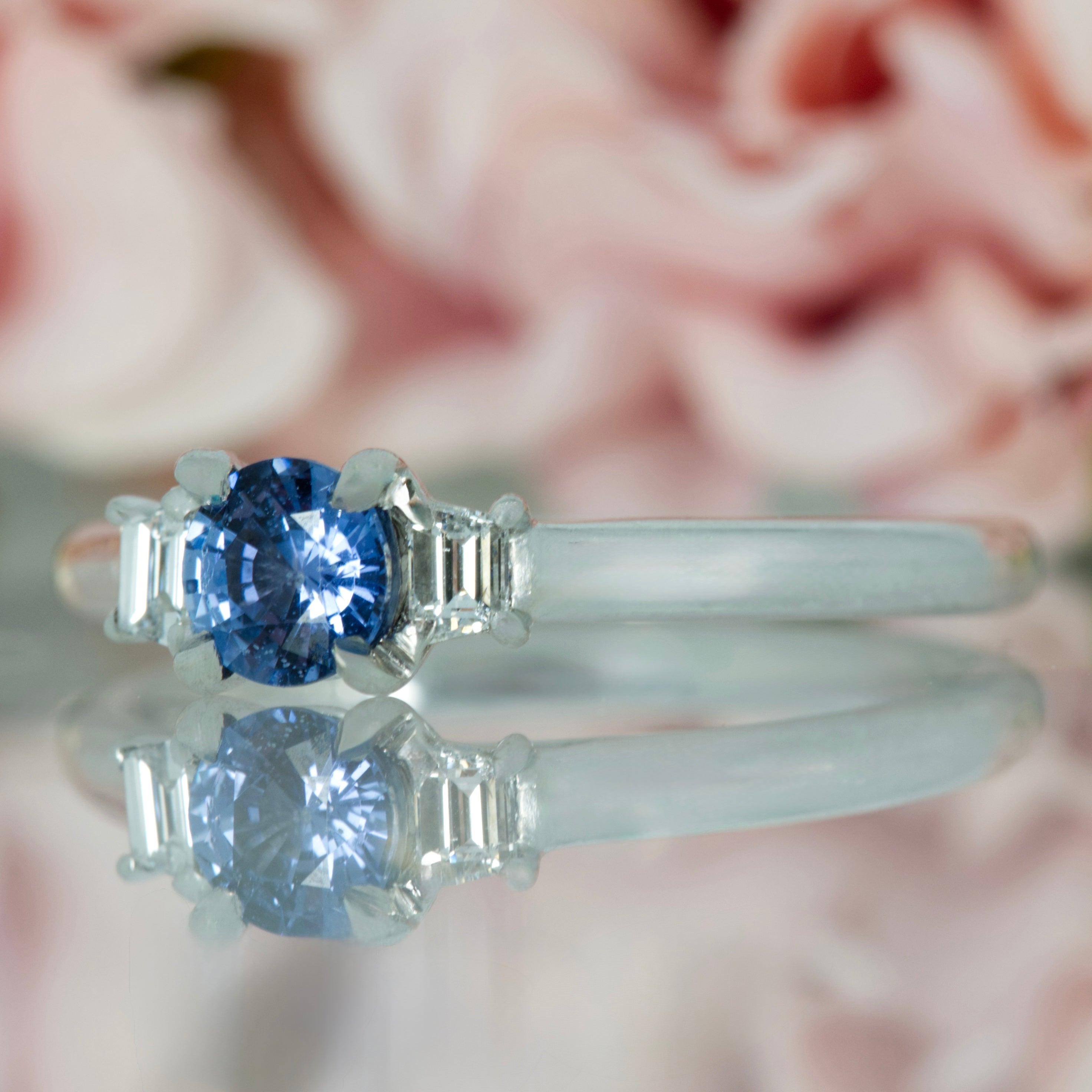 Platinum Round Cut Sapphire & Trapezoid Cut Diamond Trilogy Ring