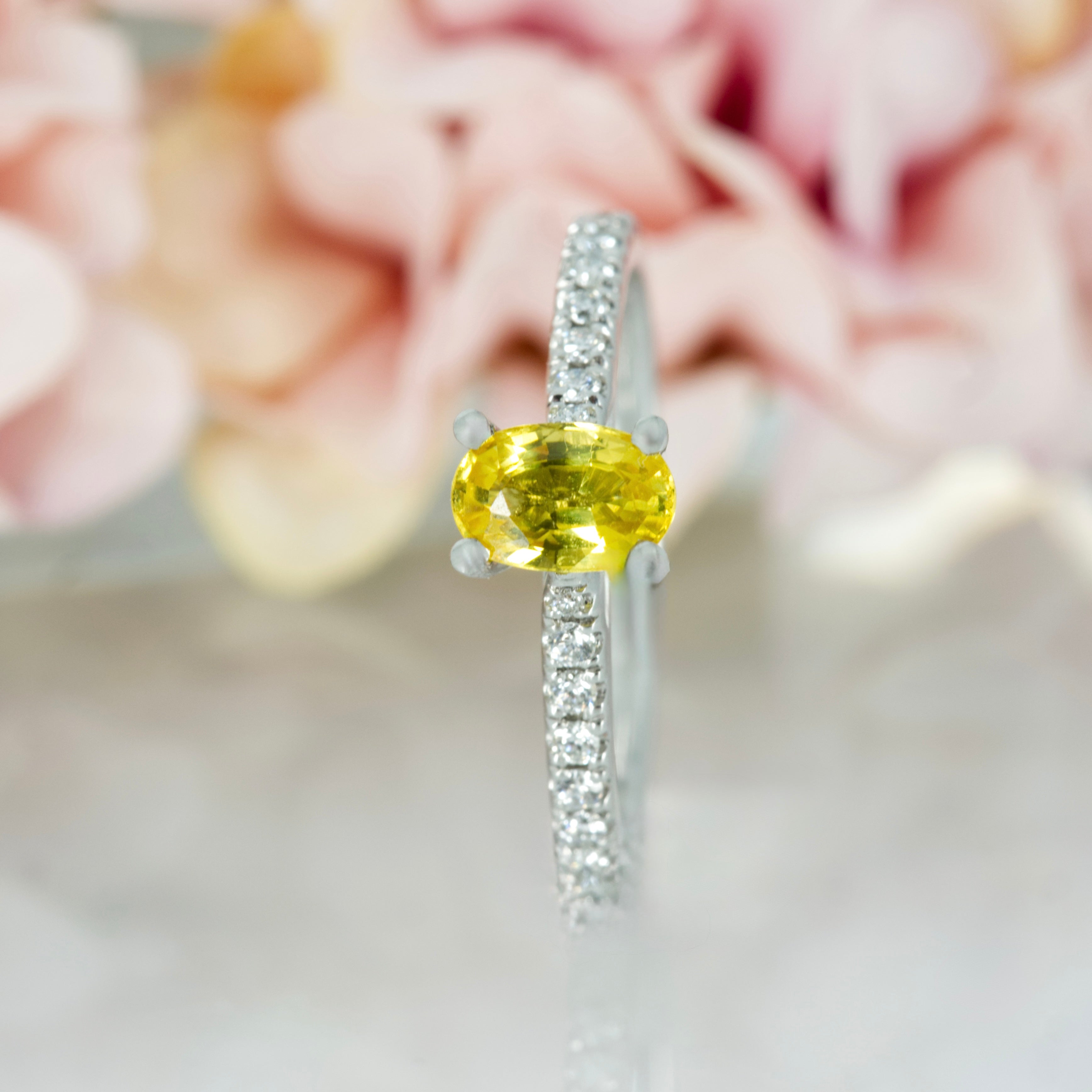 Platinum Oval Cut Yellow Sapphire & Round Brilliant Cut Diamond Ring