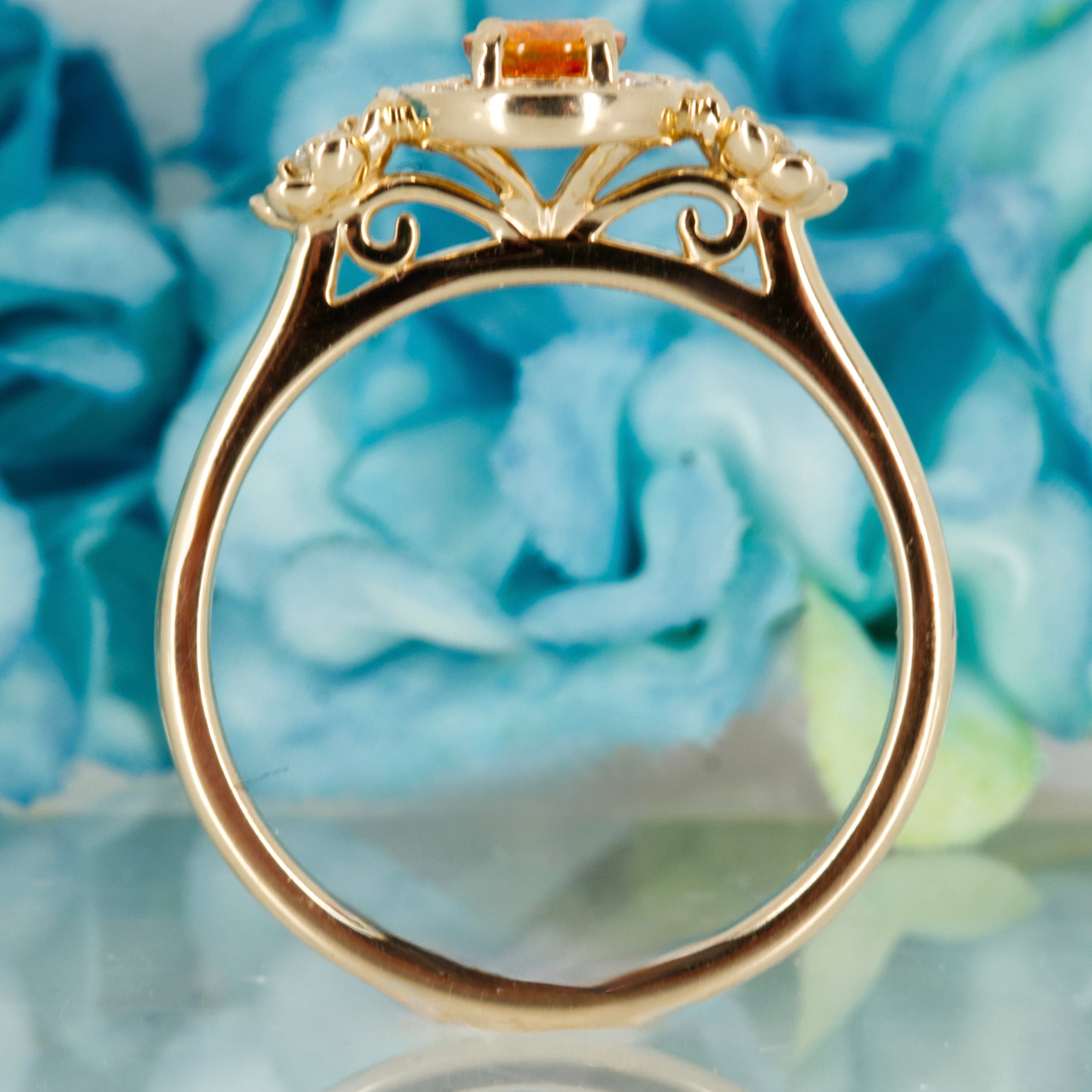 9ct Yellow Gold Oval Cut Spessartite Garnet & Round Brilliant Cut Diamond Halo Cluster Ring