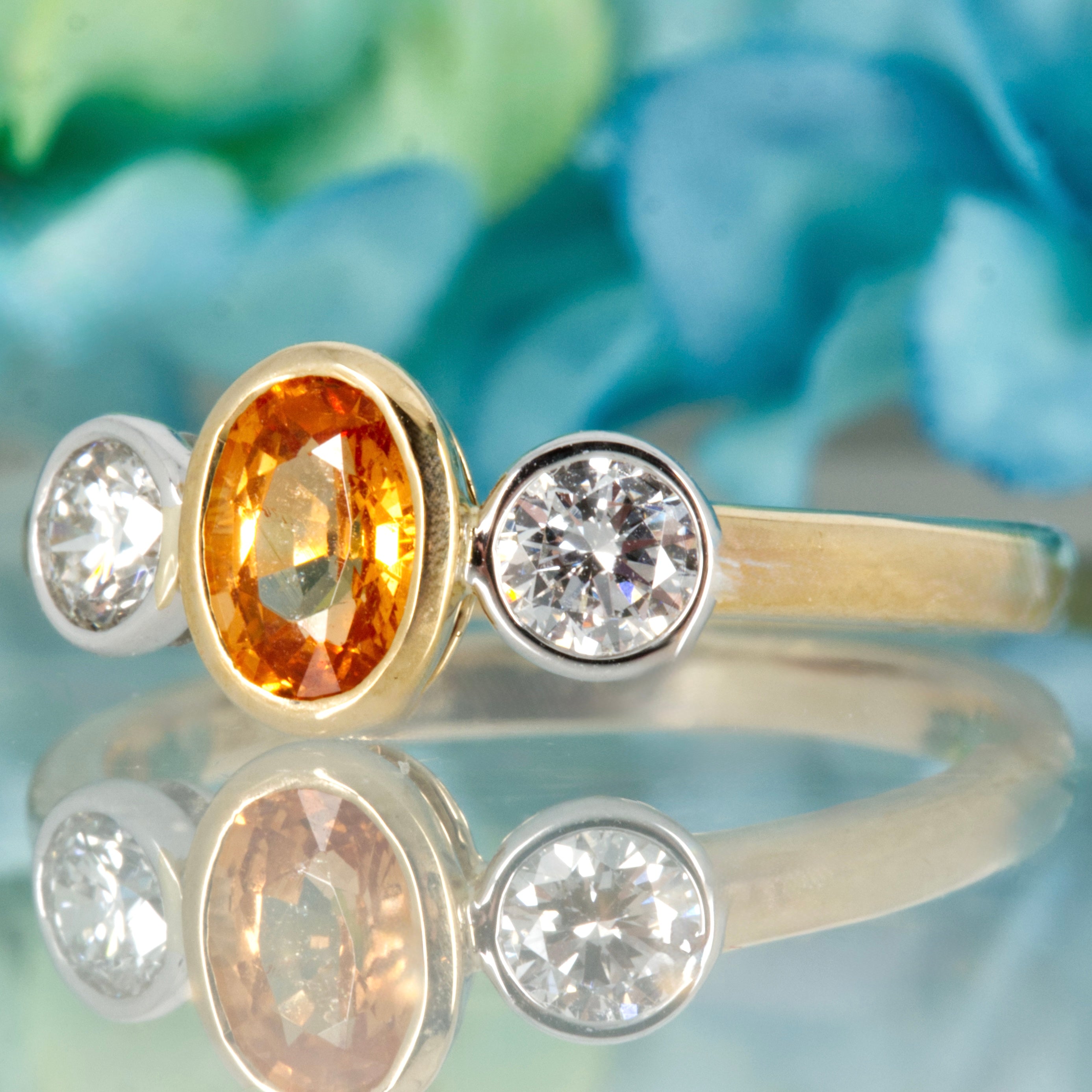 9ct Yellow Gold Oval Cut Mandarin Garnet & Round Brilliant Cut Diamond Trilogy Ring