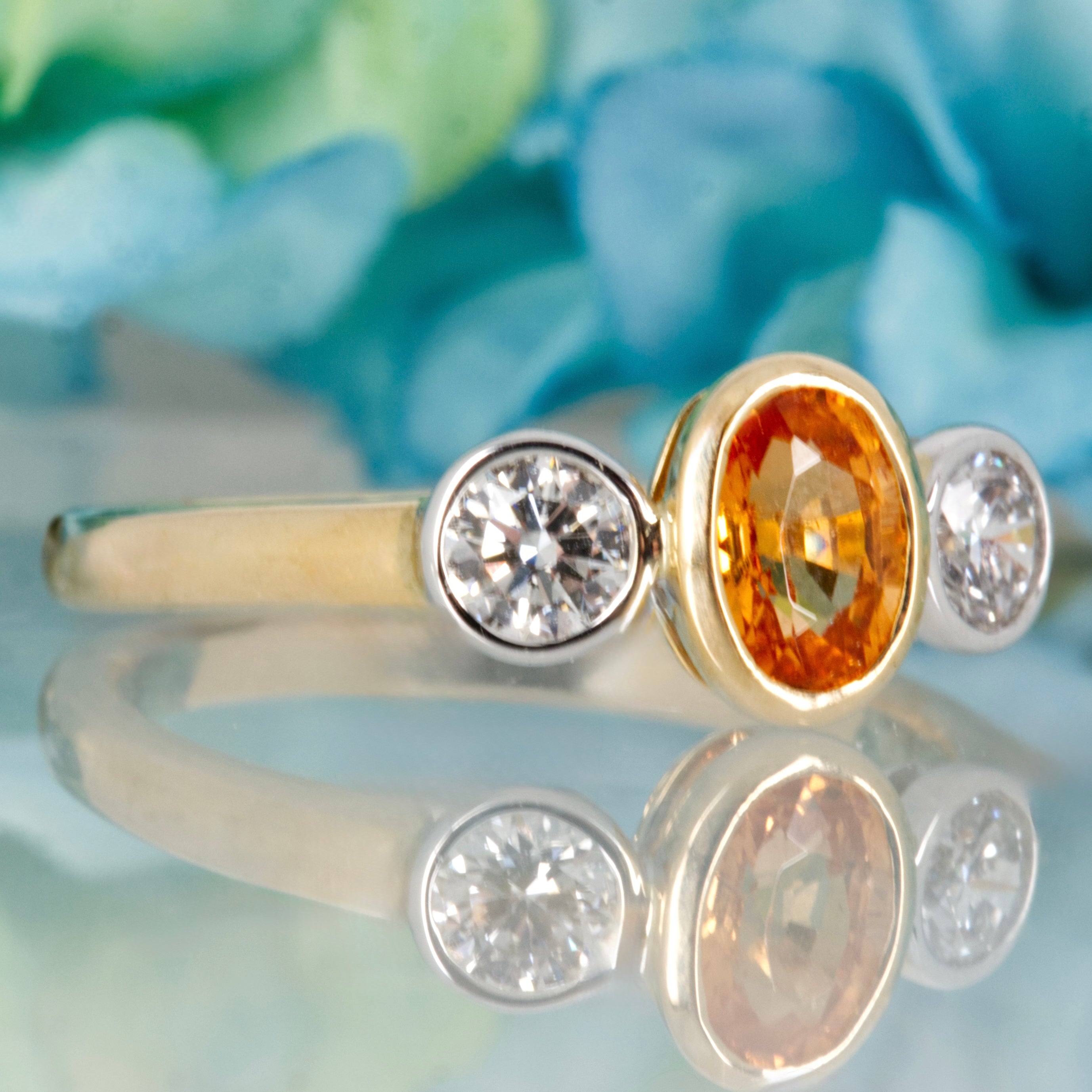 9ct Yellow Gold Oval Cut Mandarin Garnet & Round Brilliant Cut Diamond Trilogy Ring