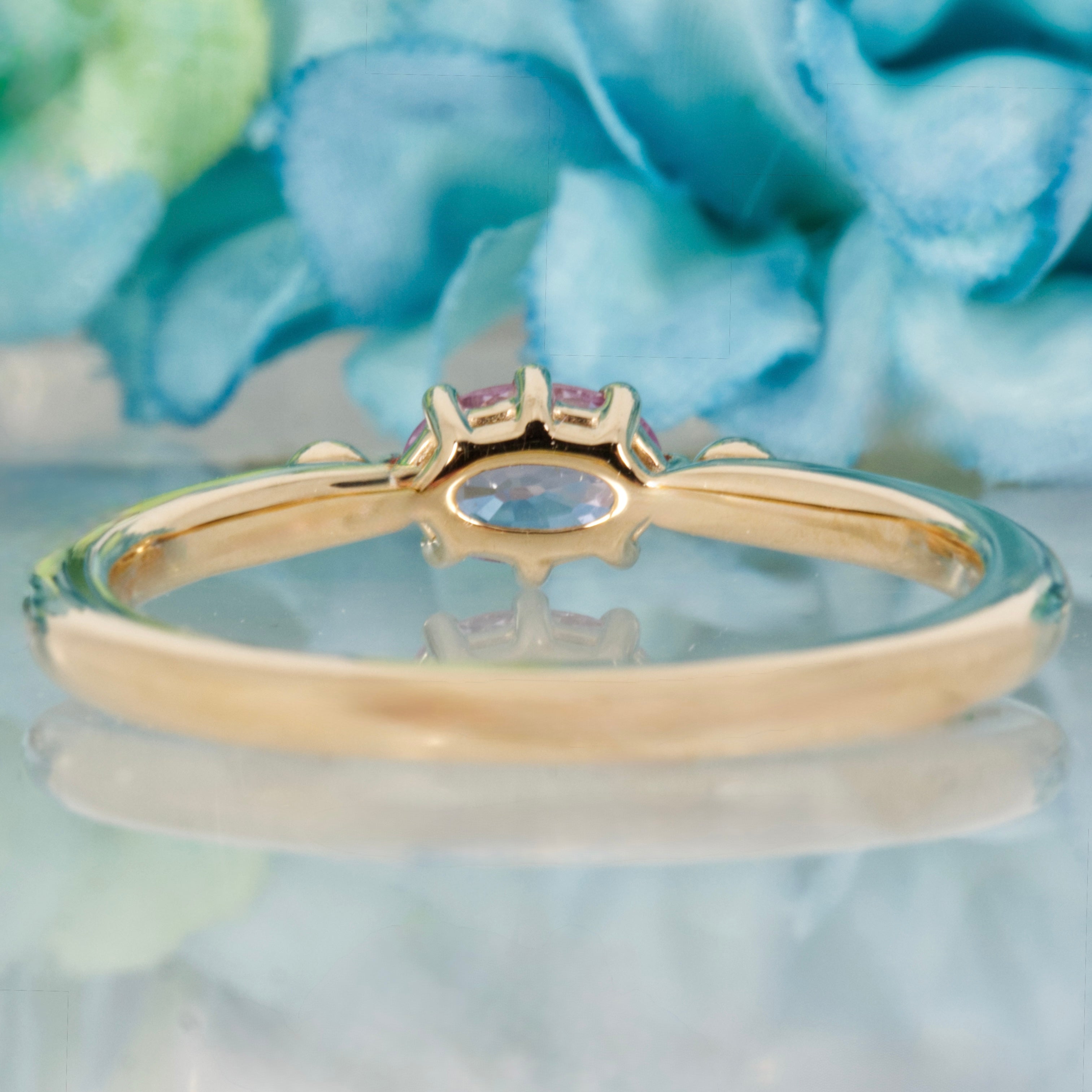 9ct Yellow Gold Oval Cut Pink Sapphire & Round Brilliant Cut Diamond Trilogy Ring